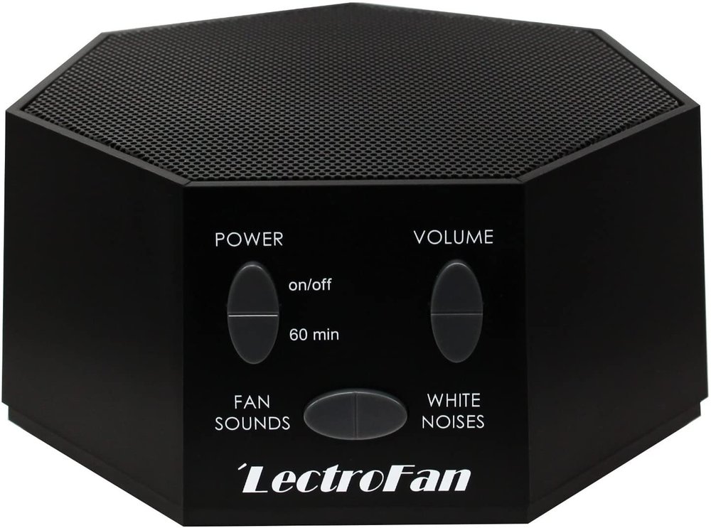Lectrofan White Noise Machine. A small black octogon with a speaker on the top side.