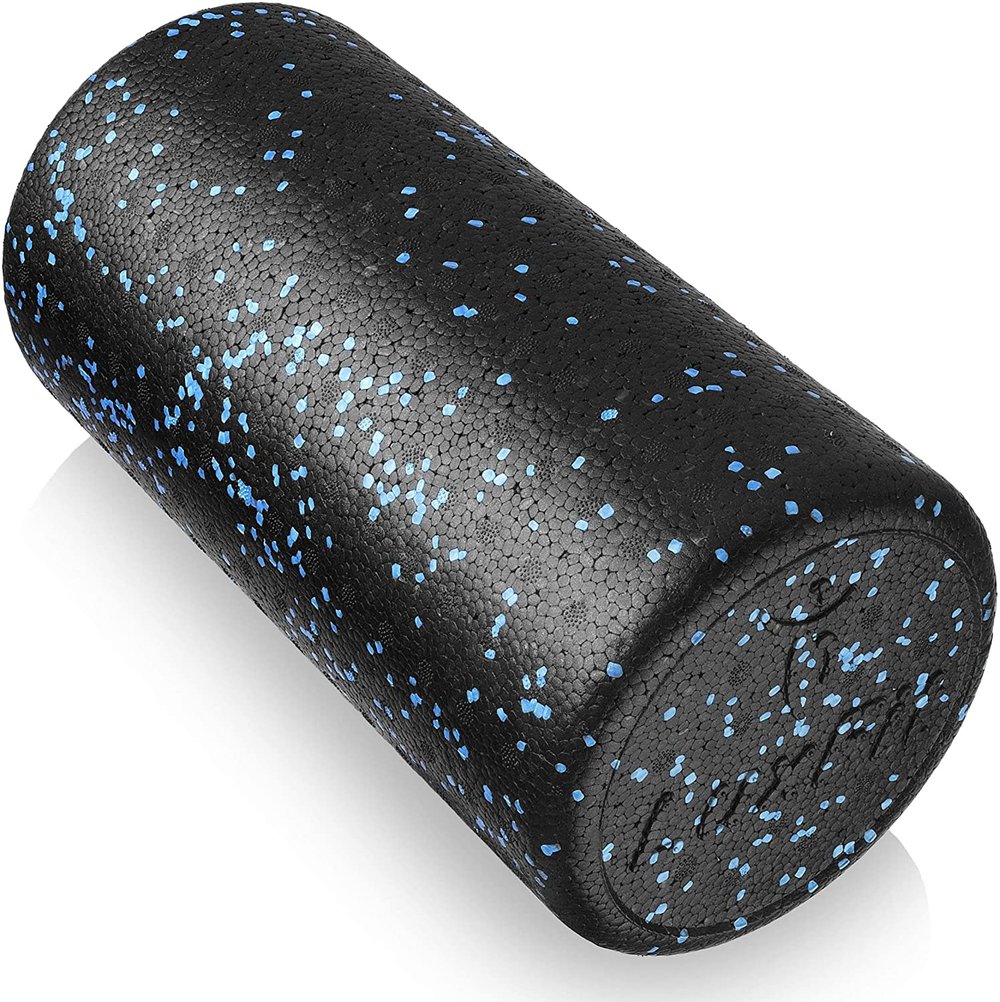 A black foam roller with turquoise speckles