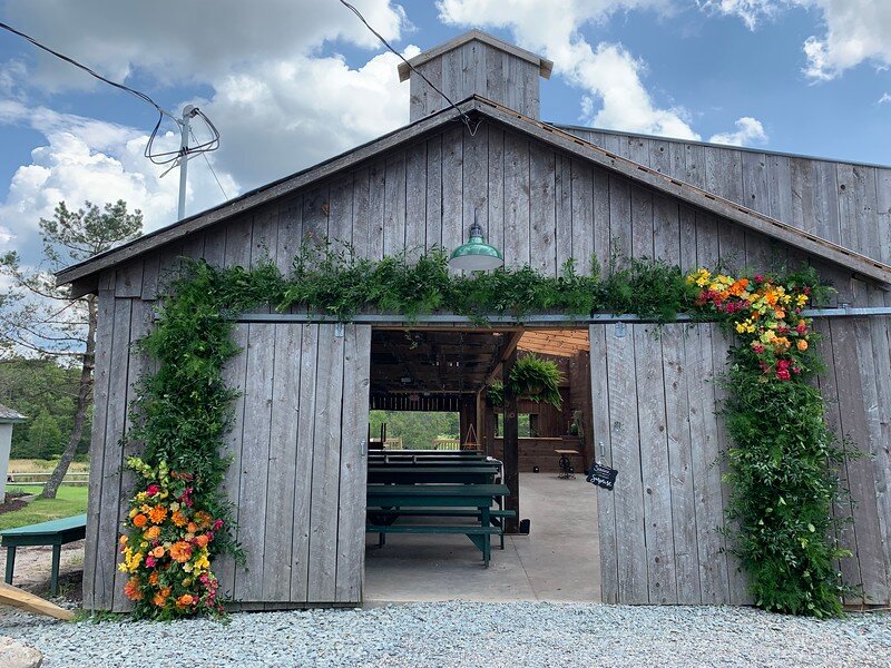 greenery-barn-arch-wedding.jpg
