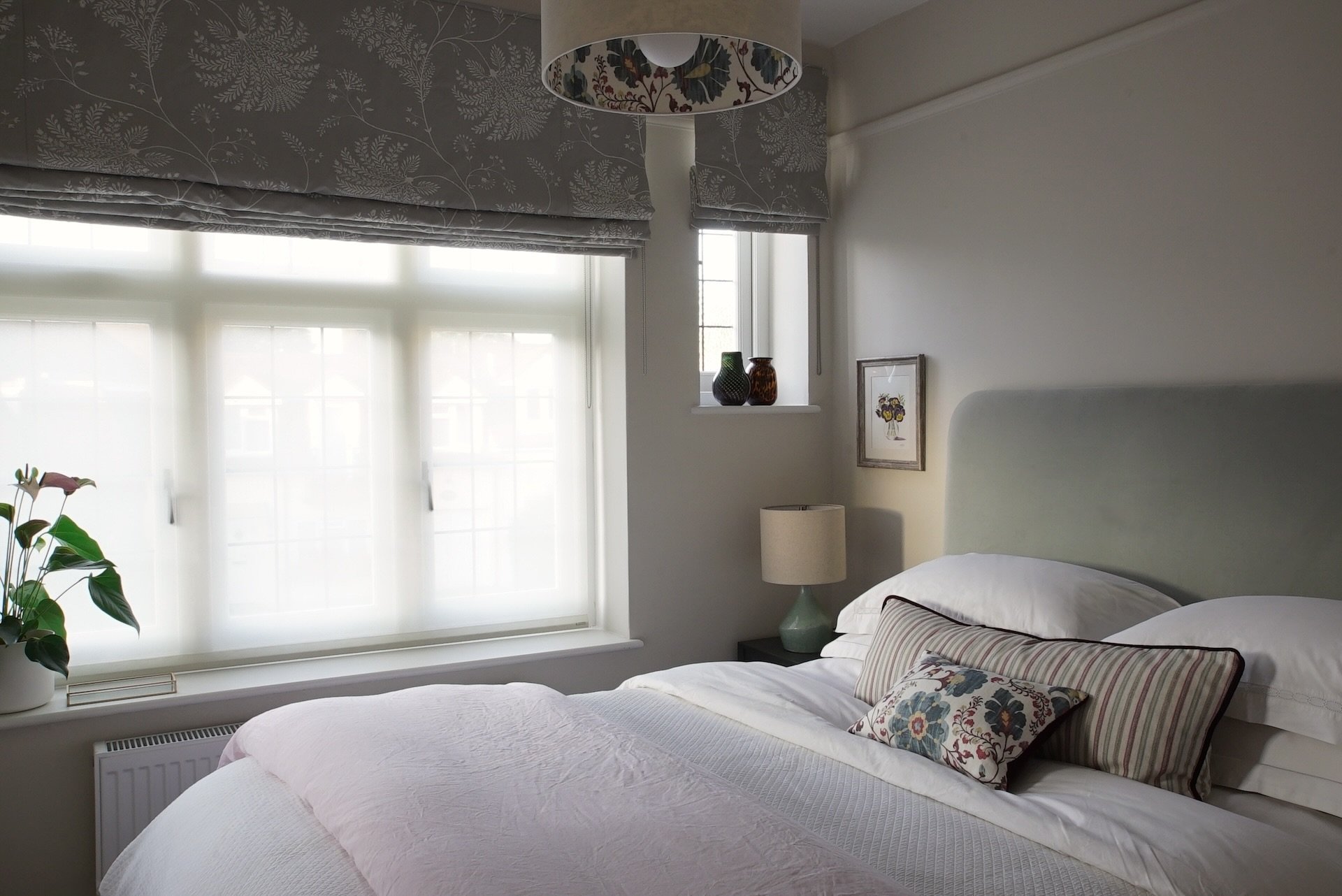 pale velvet headboard pretty bedroom.JPG