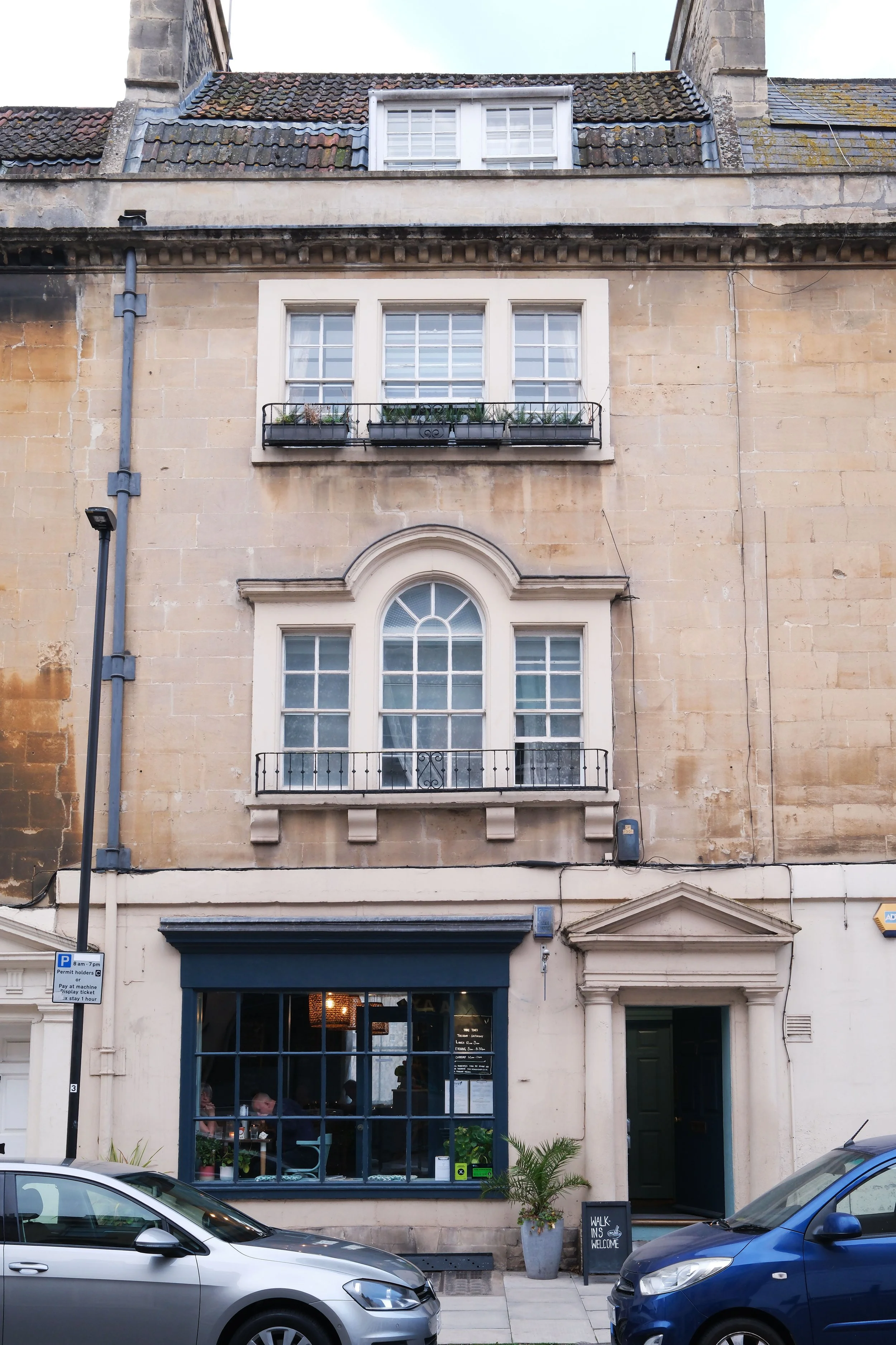Historic Georgian and Regency buildings on a residential street in Bath, England