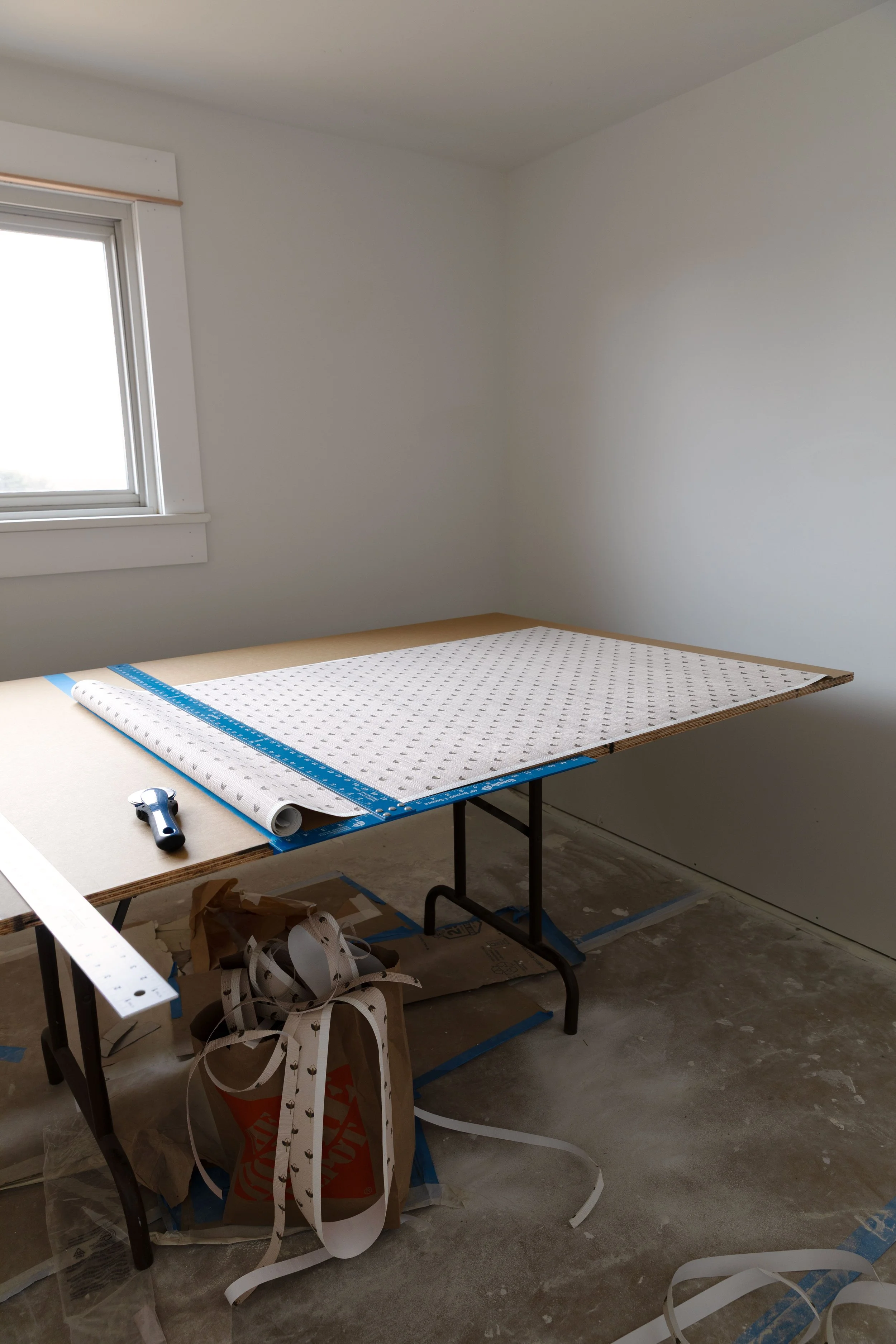 Our cutting table set up for grasscloth wallpaper installation