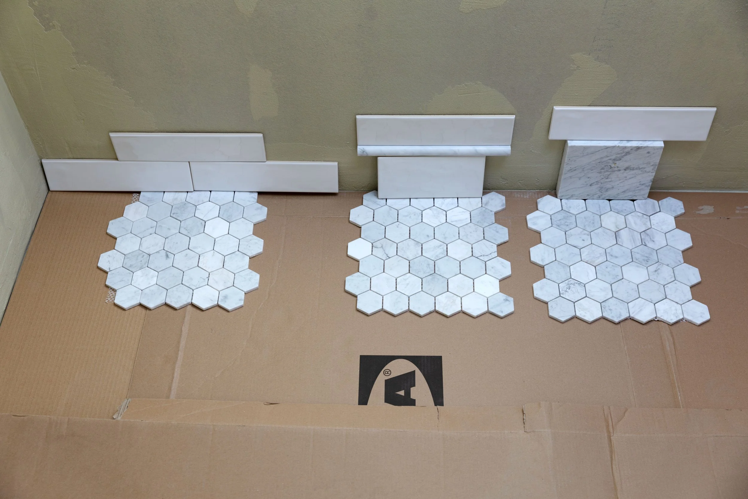 Mocking up different tile base ideas for the ensuite bathroom