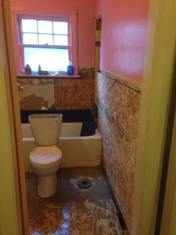 Bathroom Update: Pink Tiles No More!