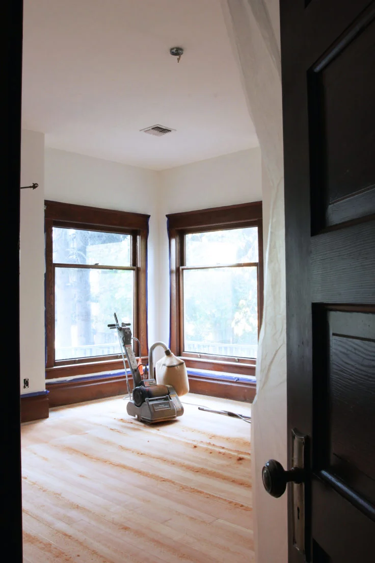 The Farmhouse // Refinishing our 104-year-old Hardwood Floors Ourselves