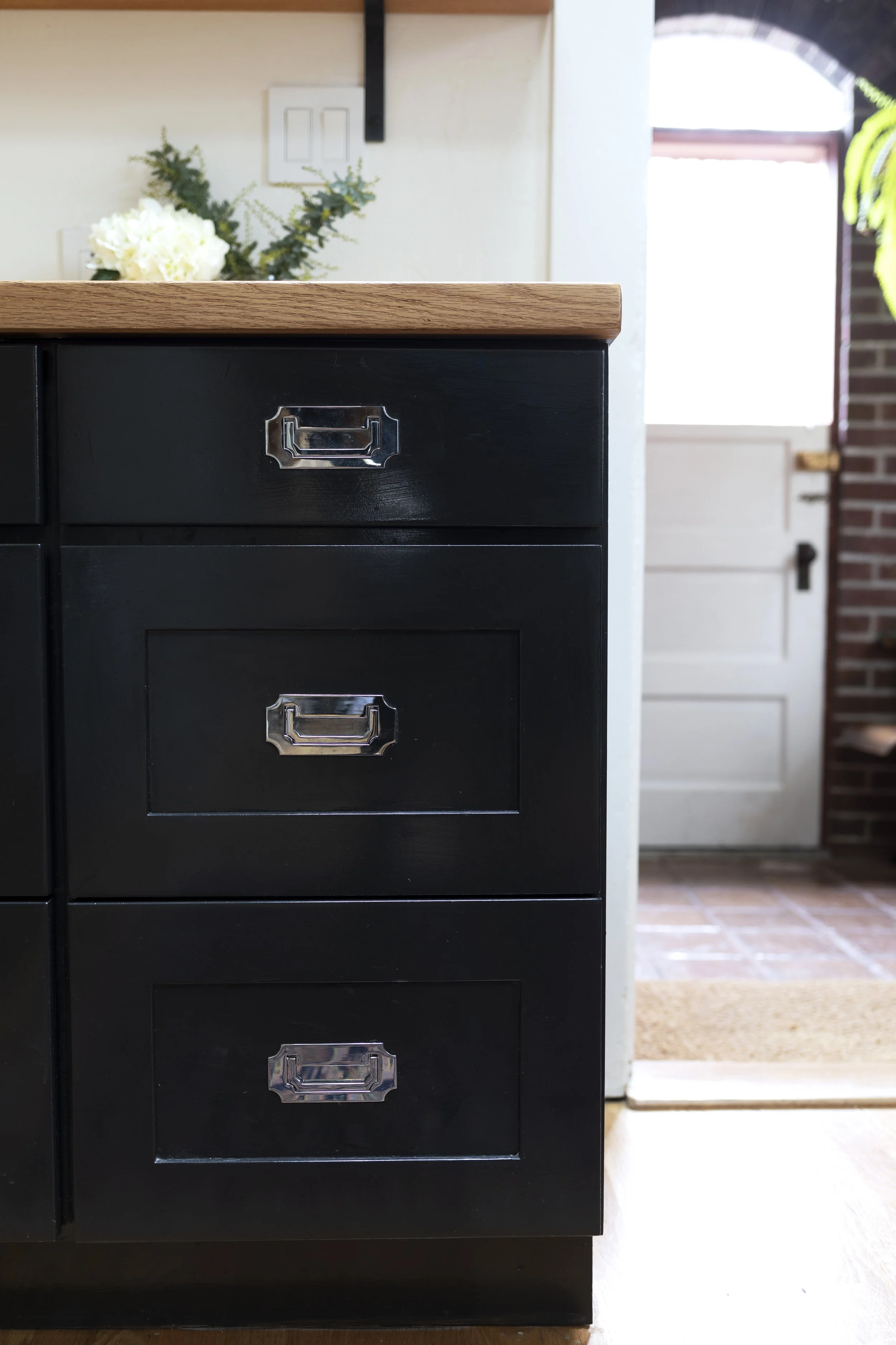 The Grit and Polish - Dexter Kitchen black Cabinets repainted.jpg