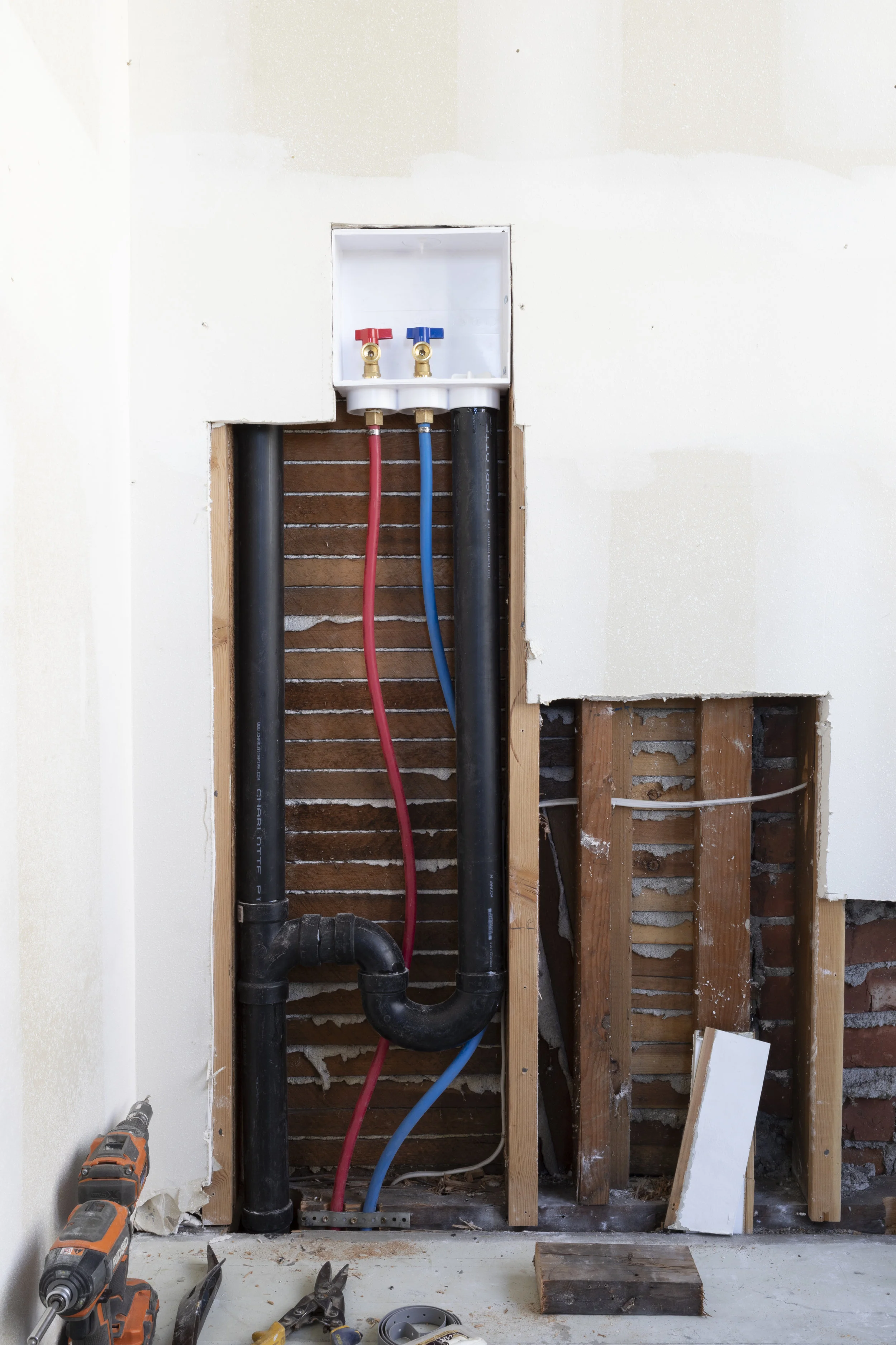 The Grit and Polish - Farmhouse Laundry Room Demo Plumbing Close.jpg