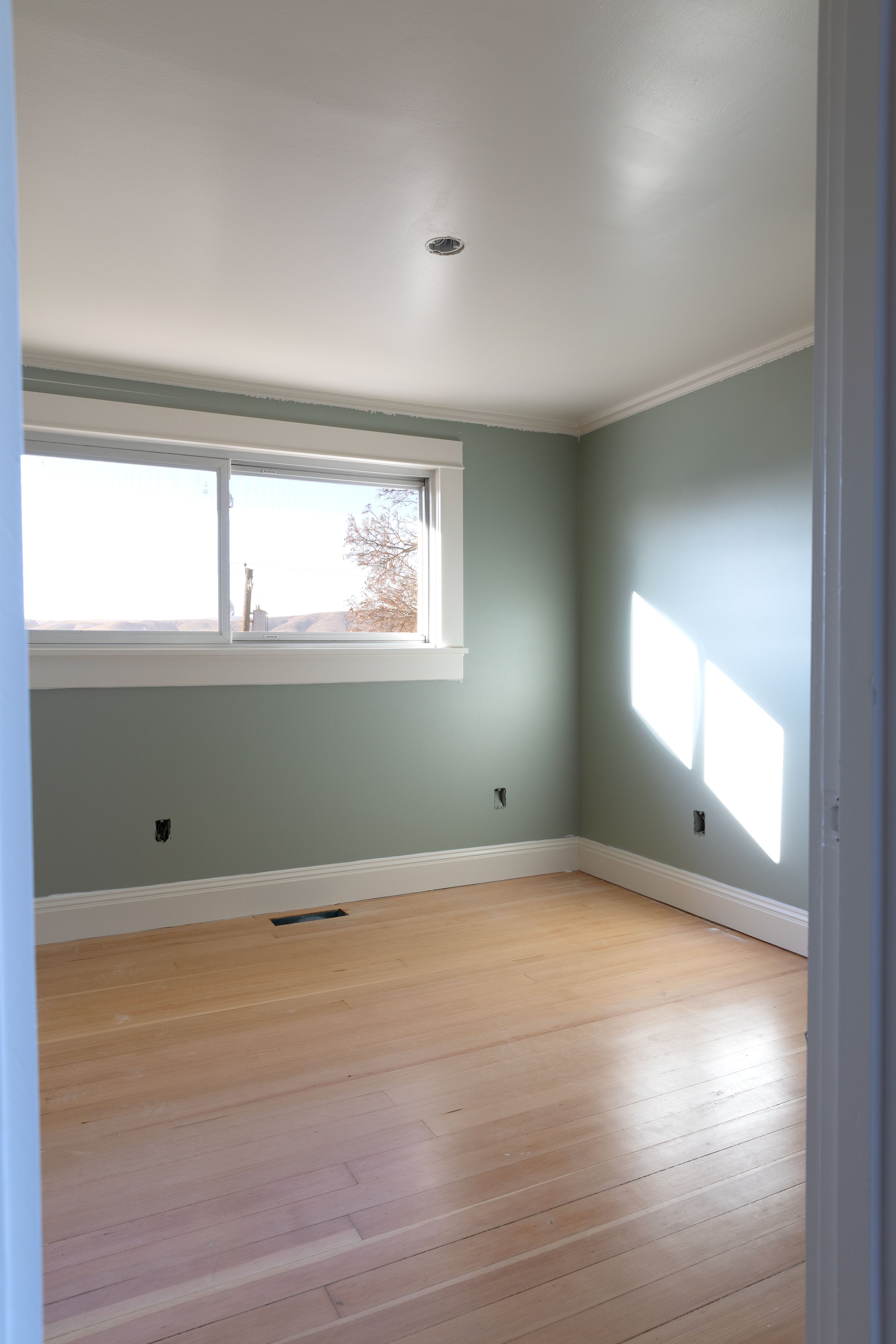 Brooks bedroom painted Farrow and Ball Blue Gray with Slipper Satin trim and refinished fir floors