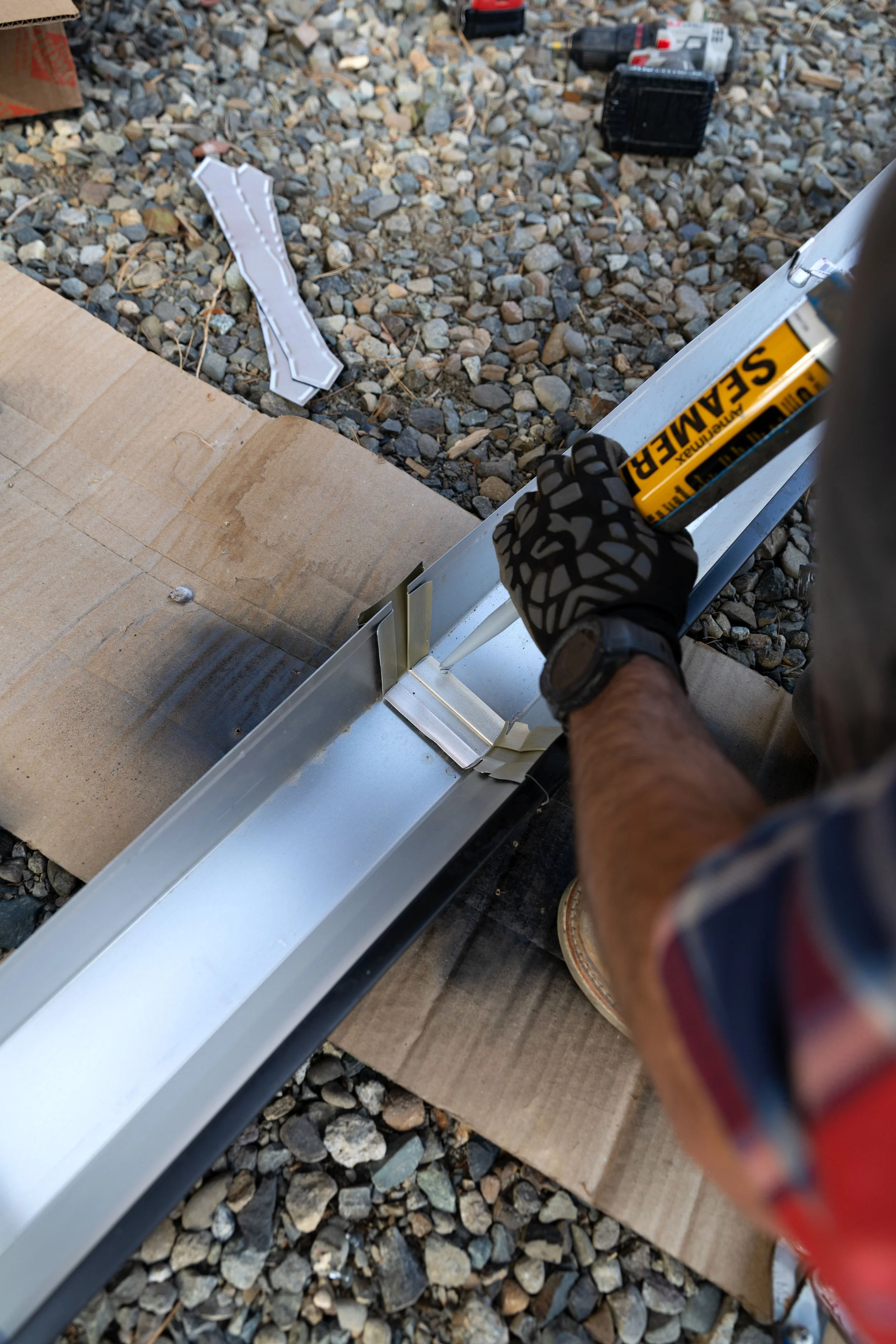 How to install gutters yourself — step-by-step black aluminum gutter guide