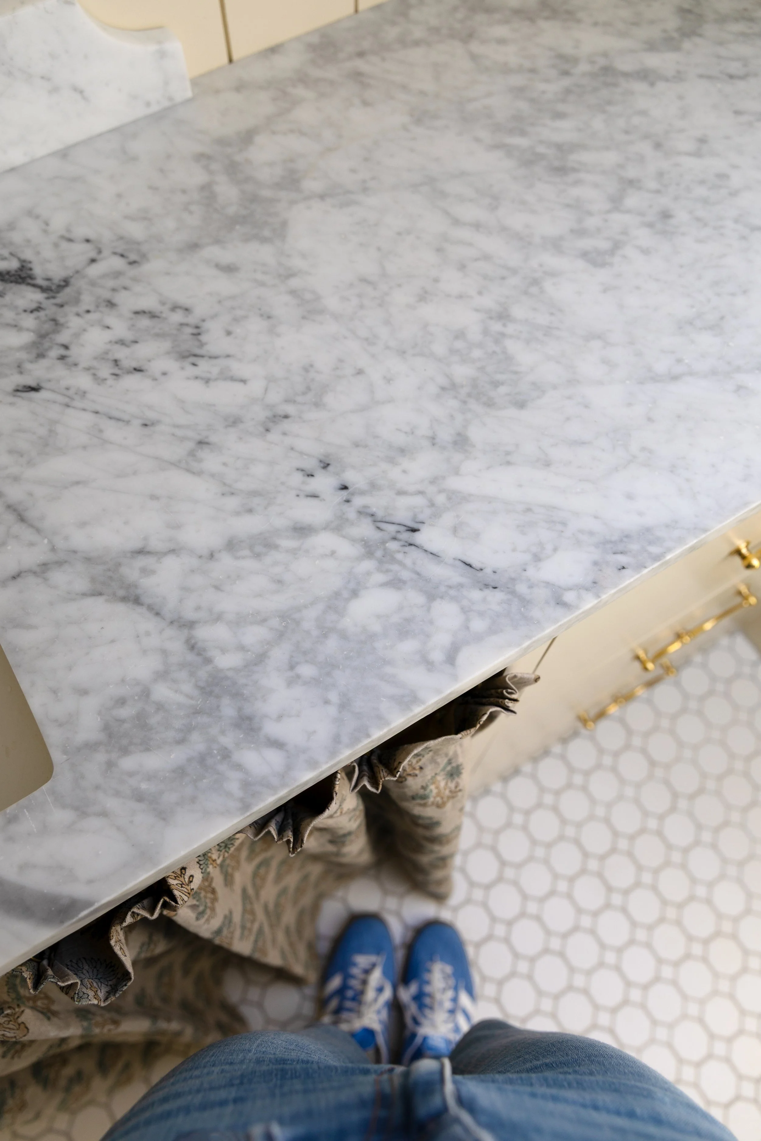 Close-up of our salvaged marble bathroom countertop in the Hill House hall bath