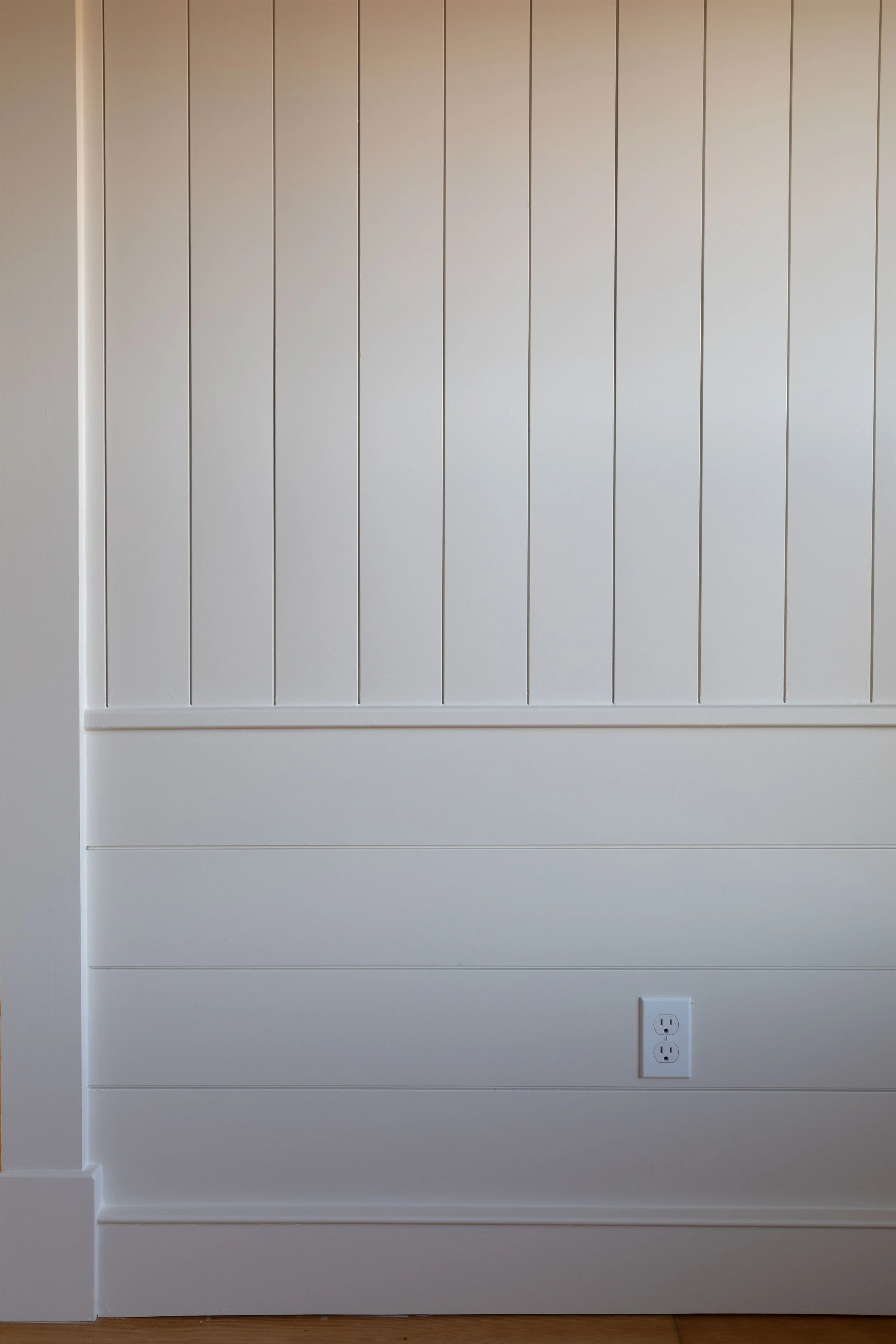 Close up detail of the horizontal and vertical wall paneling in the Hill House snug