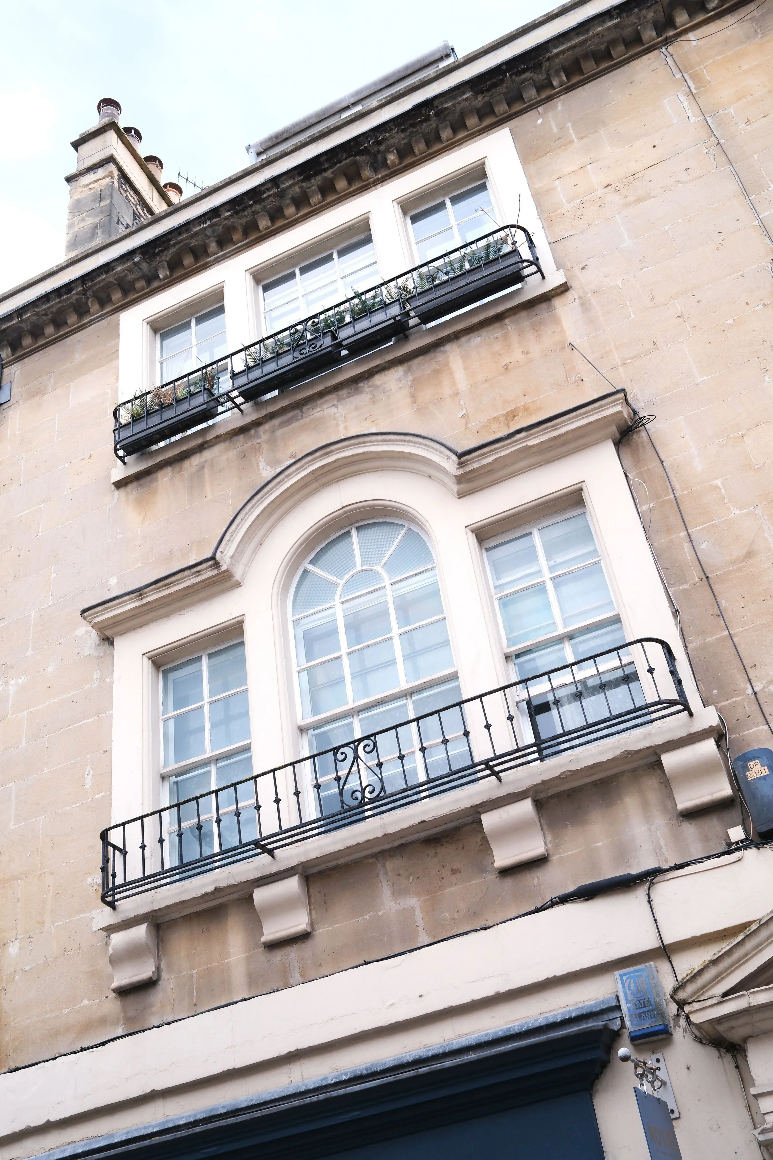 Historic Georgian and Regency buildings on a residential street in Bath, England