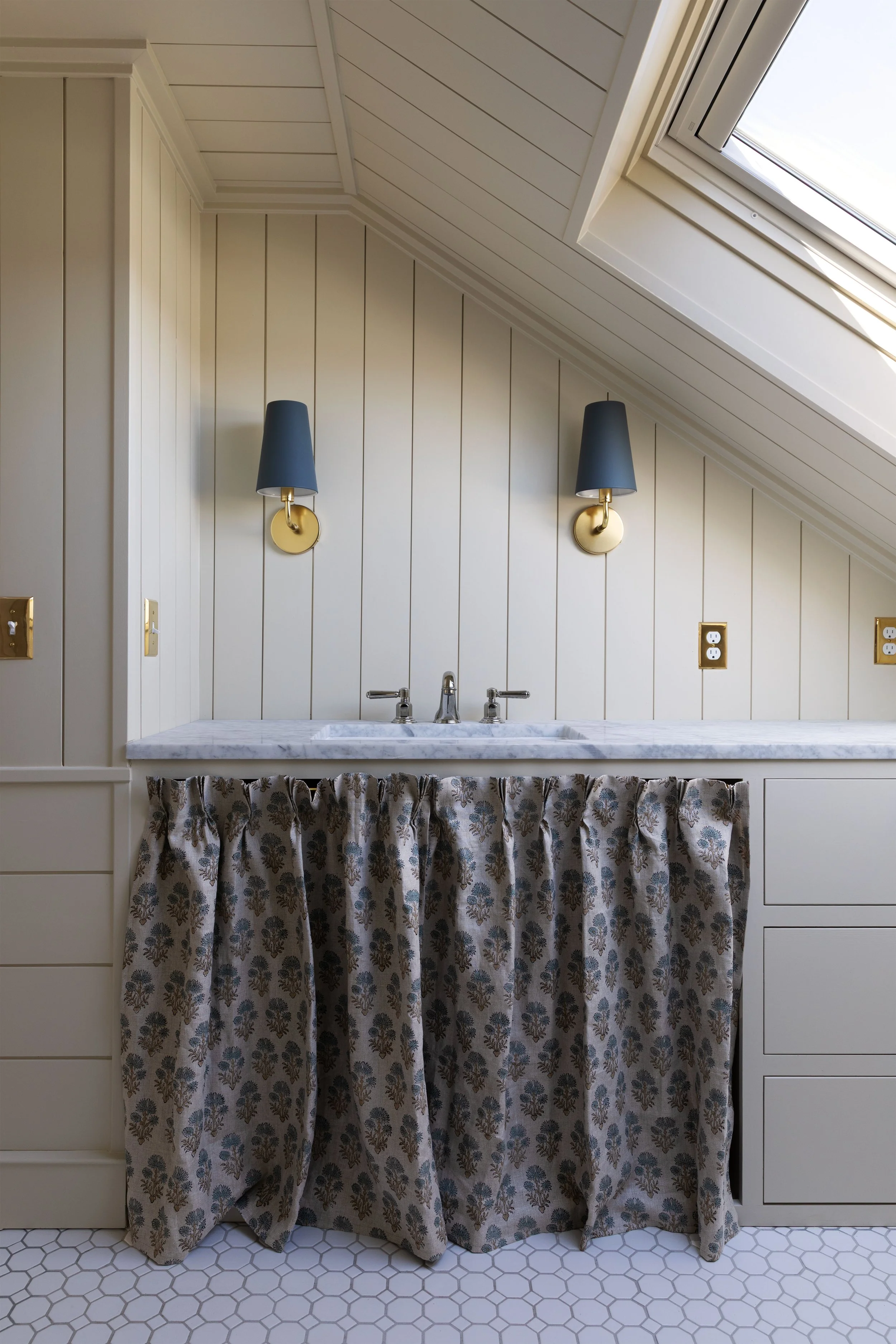 Small bathroom vanity with a gathered sink skirt in our Hill House hall bath