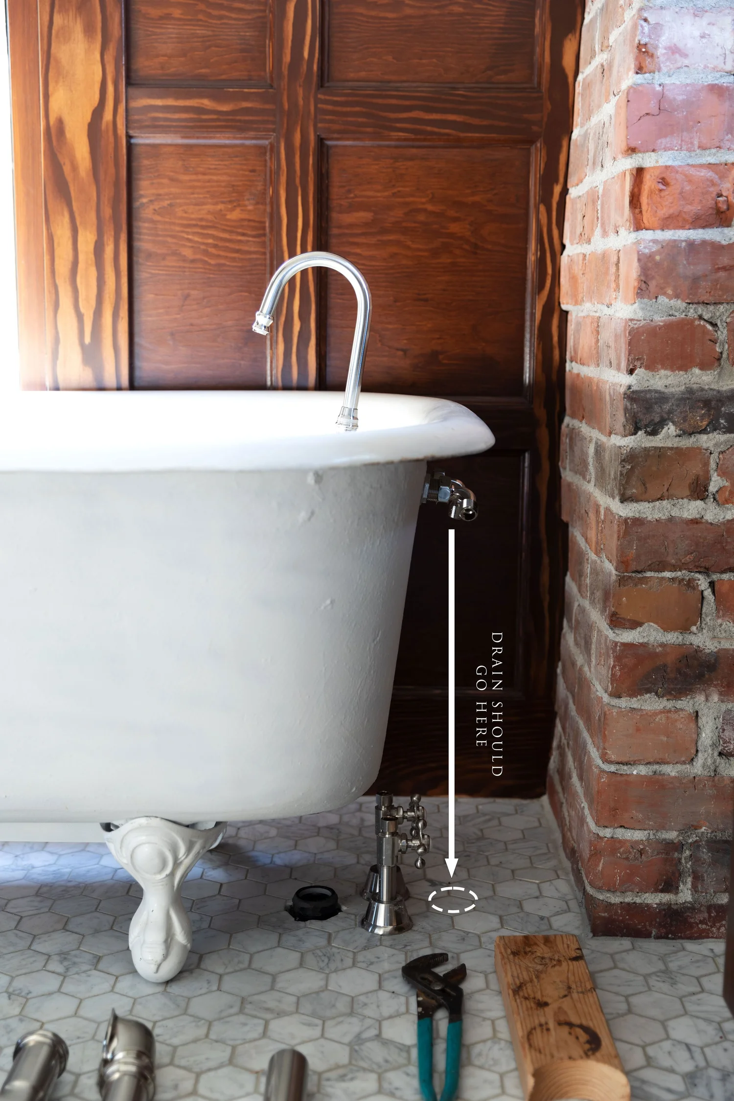 Moving the Clawfoot Tub to it's Original Spot from 1912 — The Grit and