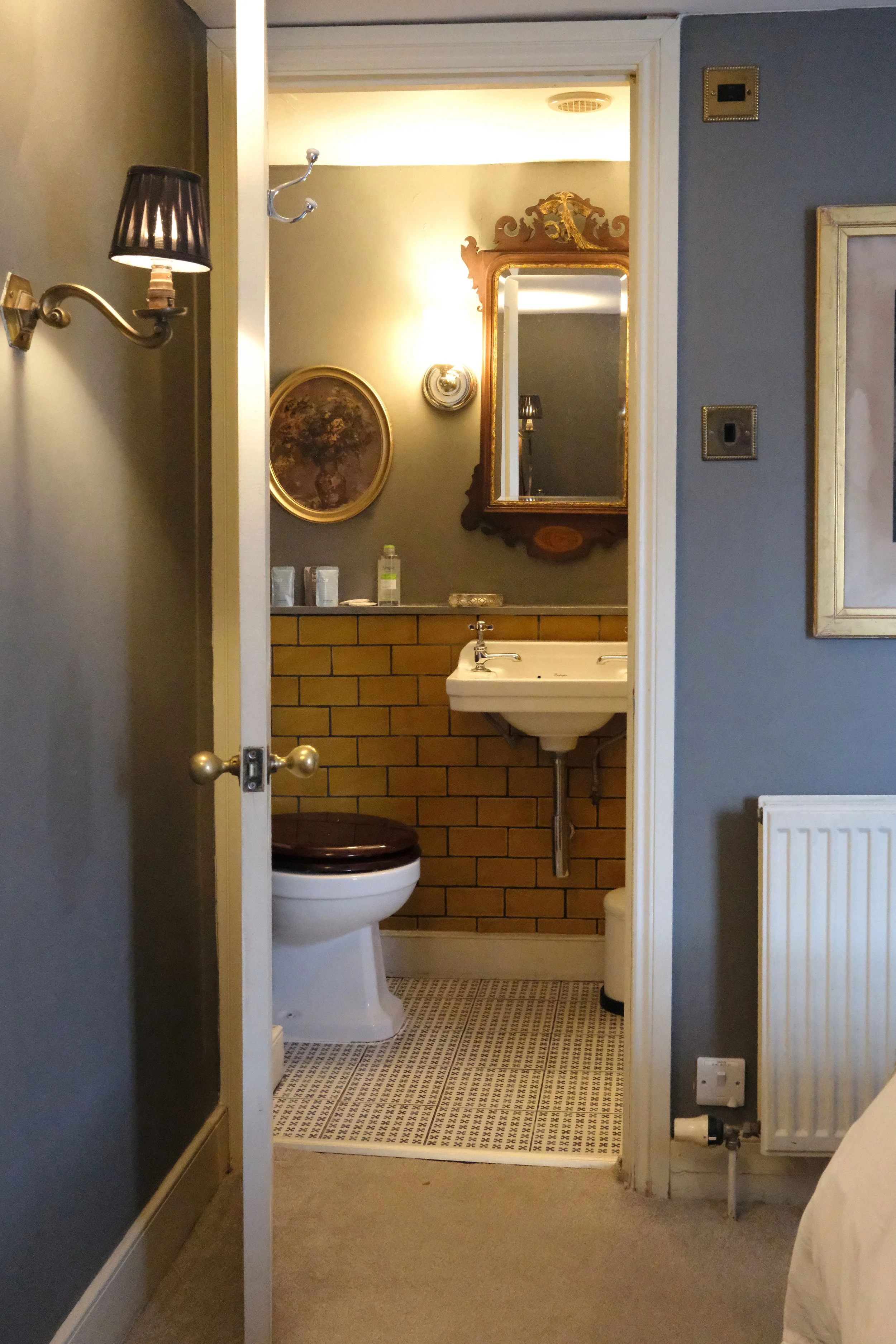 Compact primary bathroom in a historic Bath England apartment
