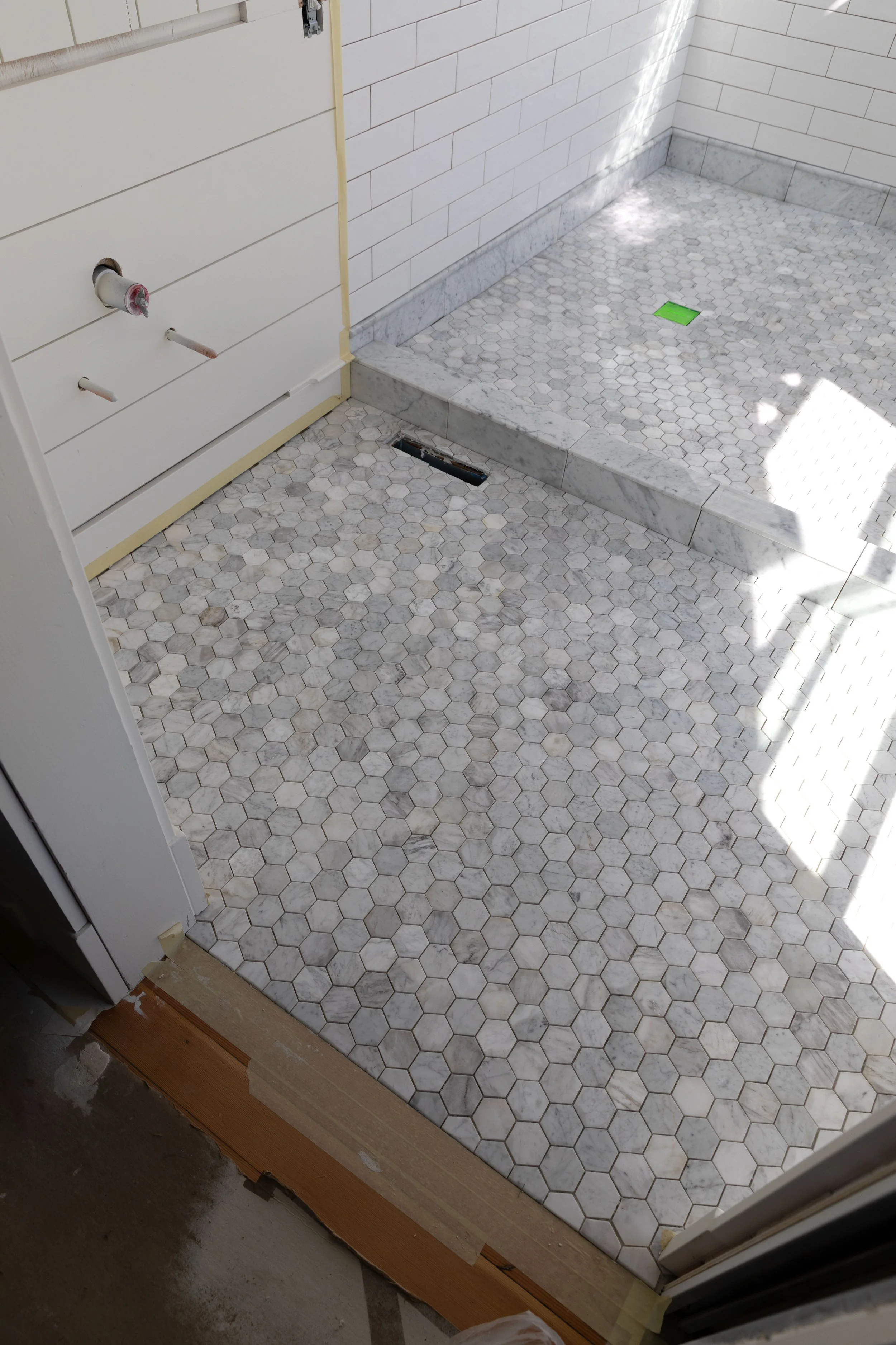 Marble hex floors in the ensuite bathroom