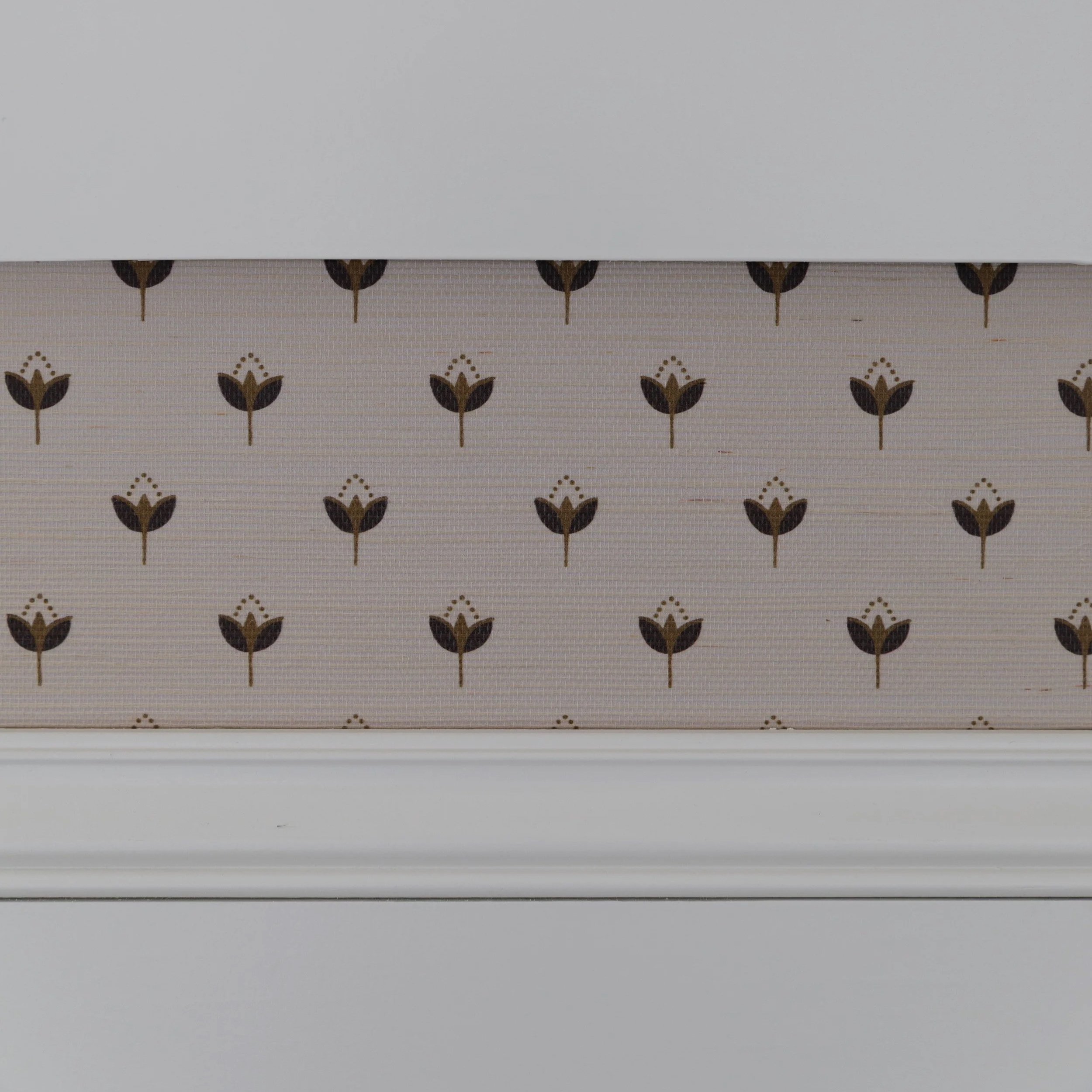 Installing painted wainscot cap over the edge of grasscloth wallpaper for a clean finish