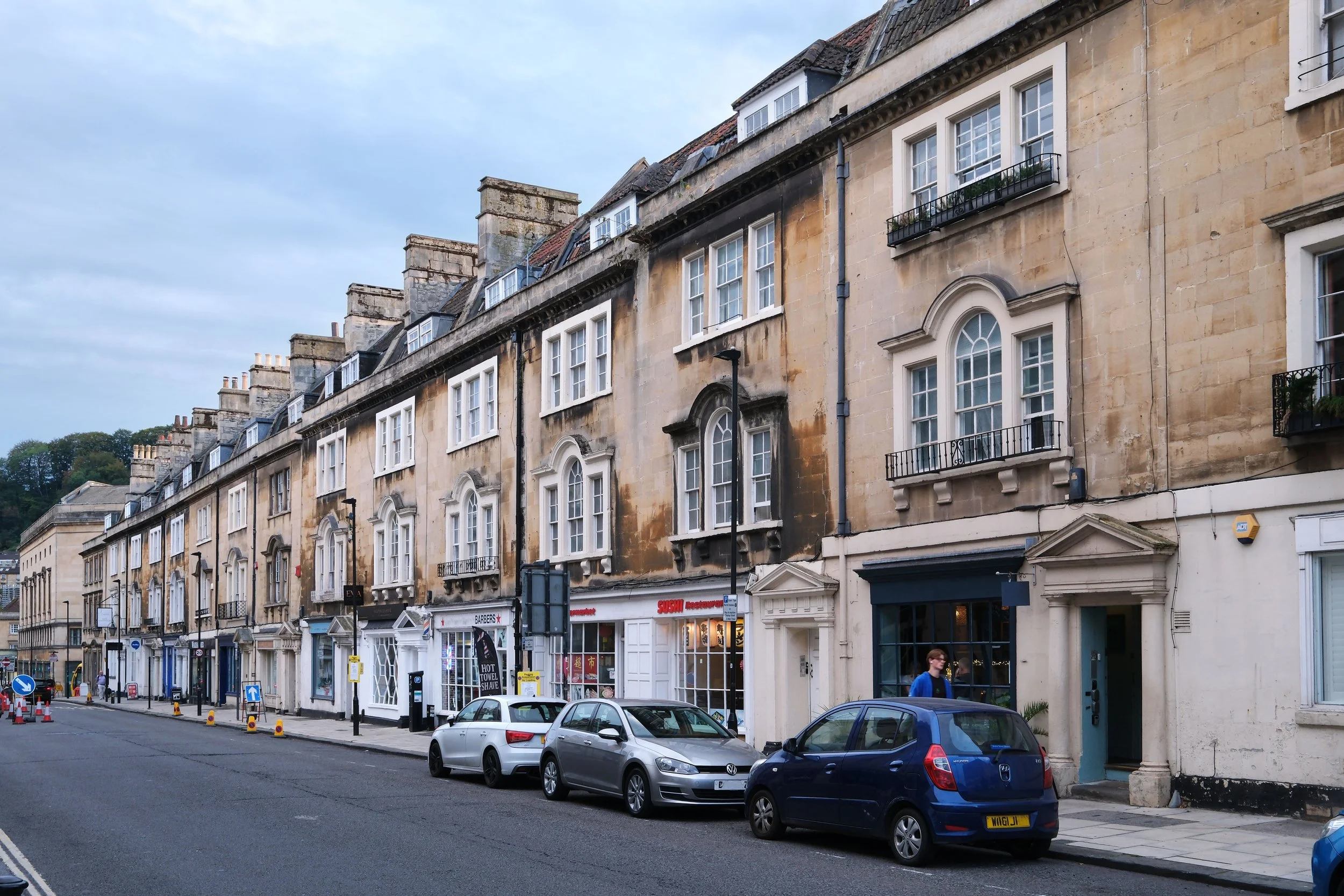 Historic Georgian and Regency buildings on a residential street in Bath, England