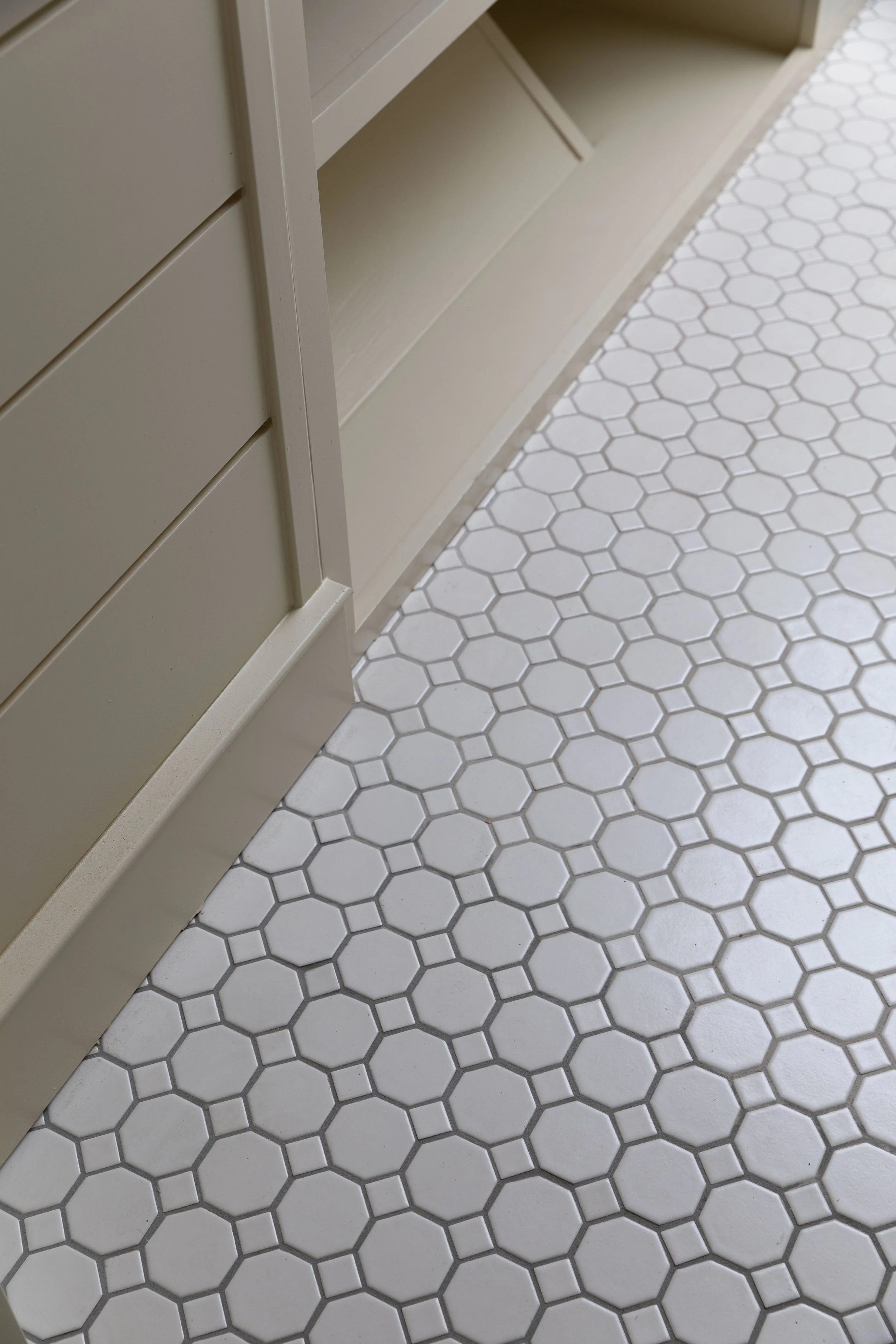 Octagon and dot tile floors with heated mats underneath