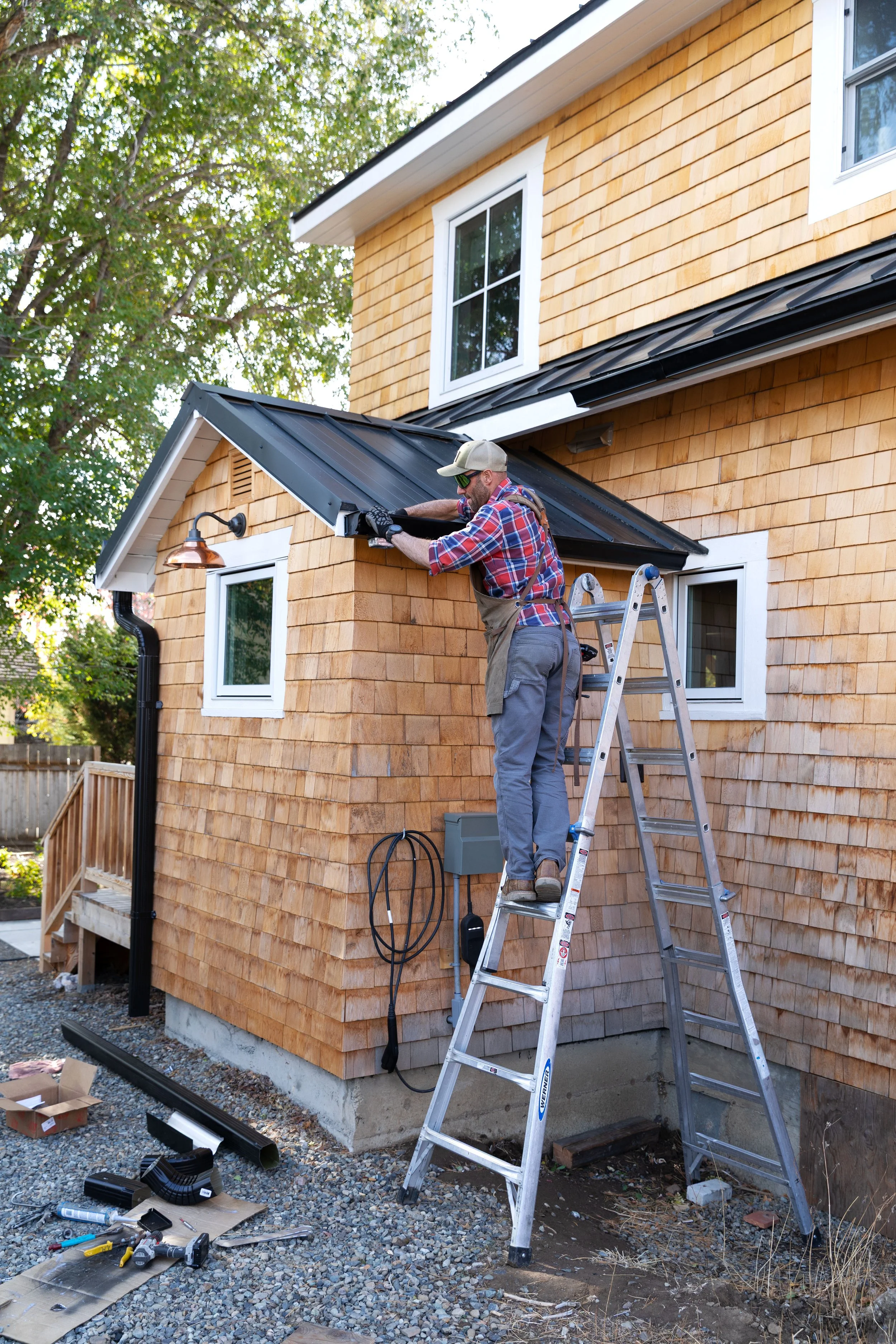 How to install gutters yourself — step-by-step black aluminum gutter guide