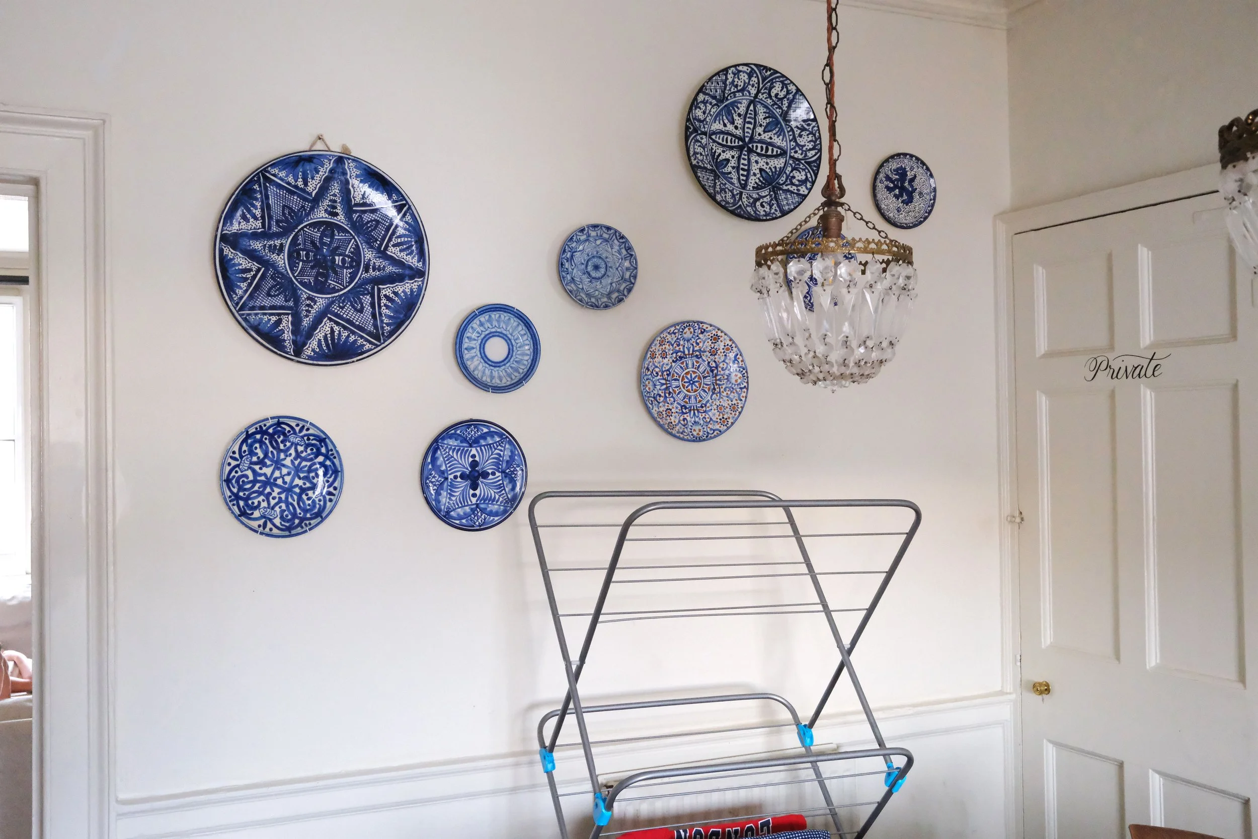 Vintage plates in the dining room of a historic Bath England apartment
