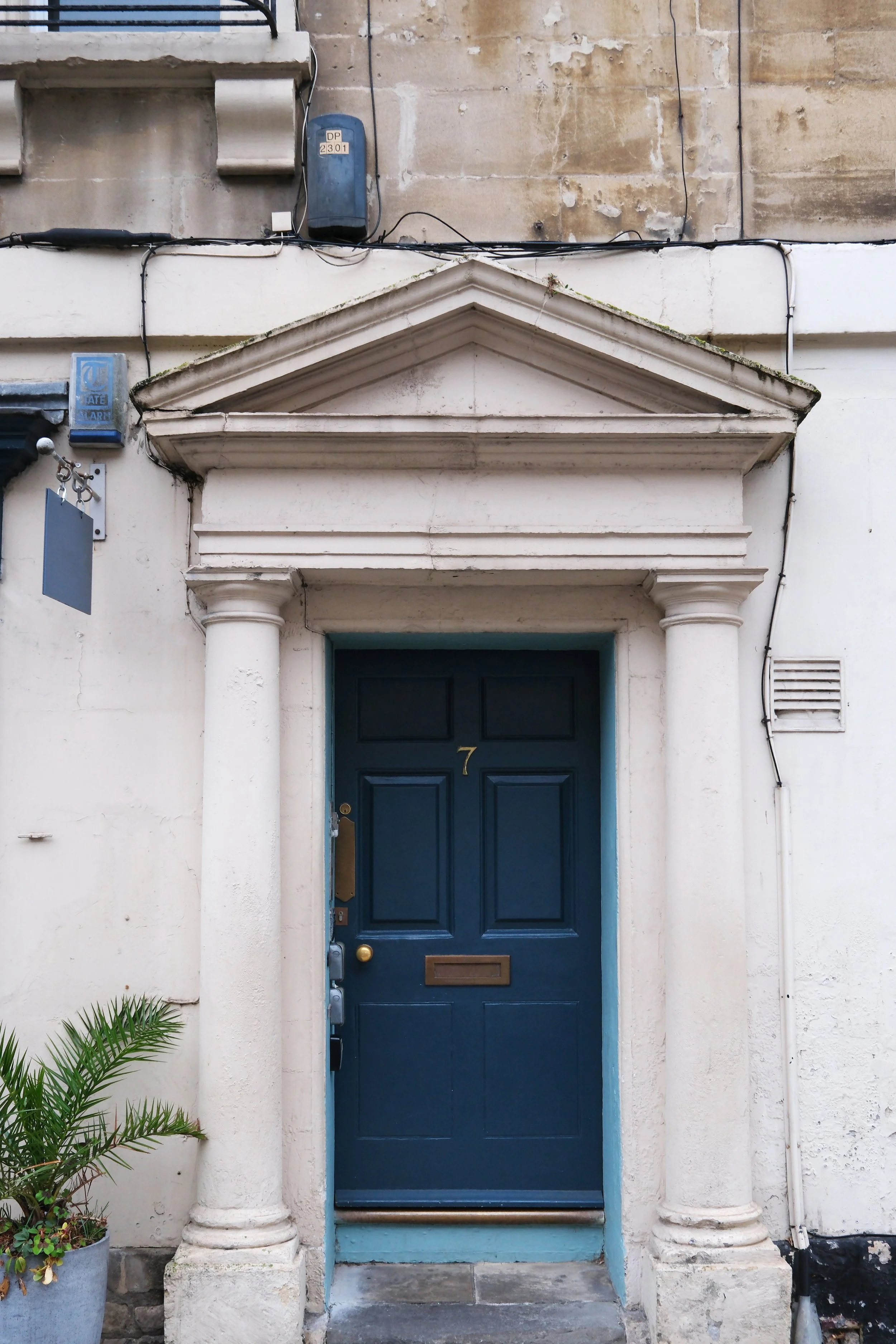 Historic Georgian and Regency buildings on a residential street in Bath, England