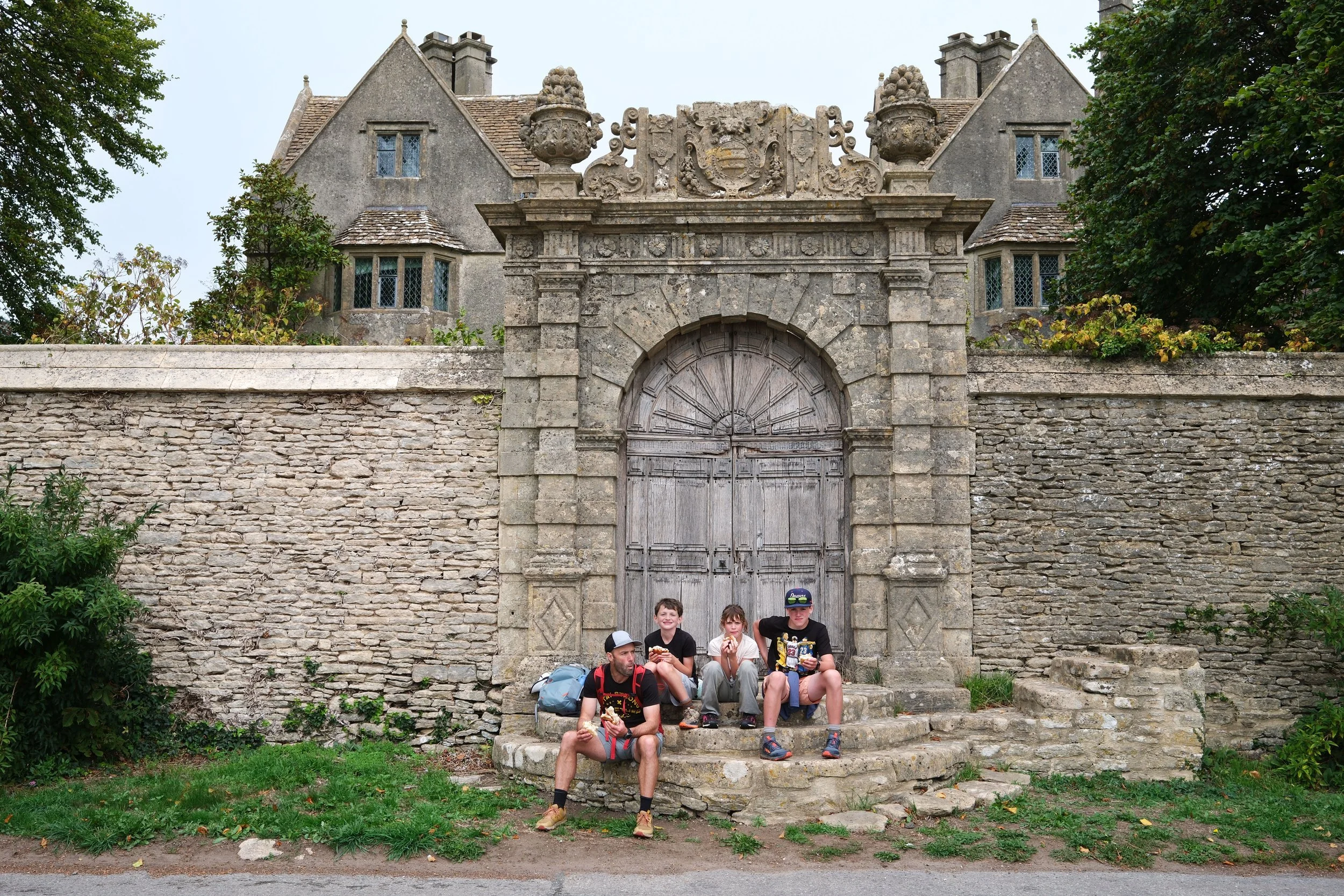 A simple picnic lunch on the steps of a manor house at Cold Ashton on the Cotswold Way