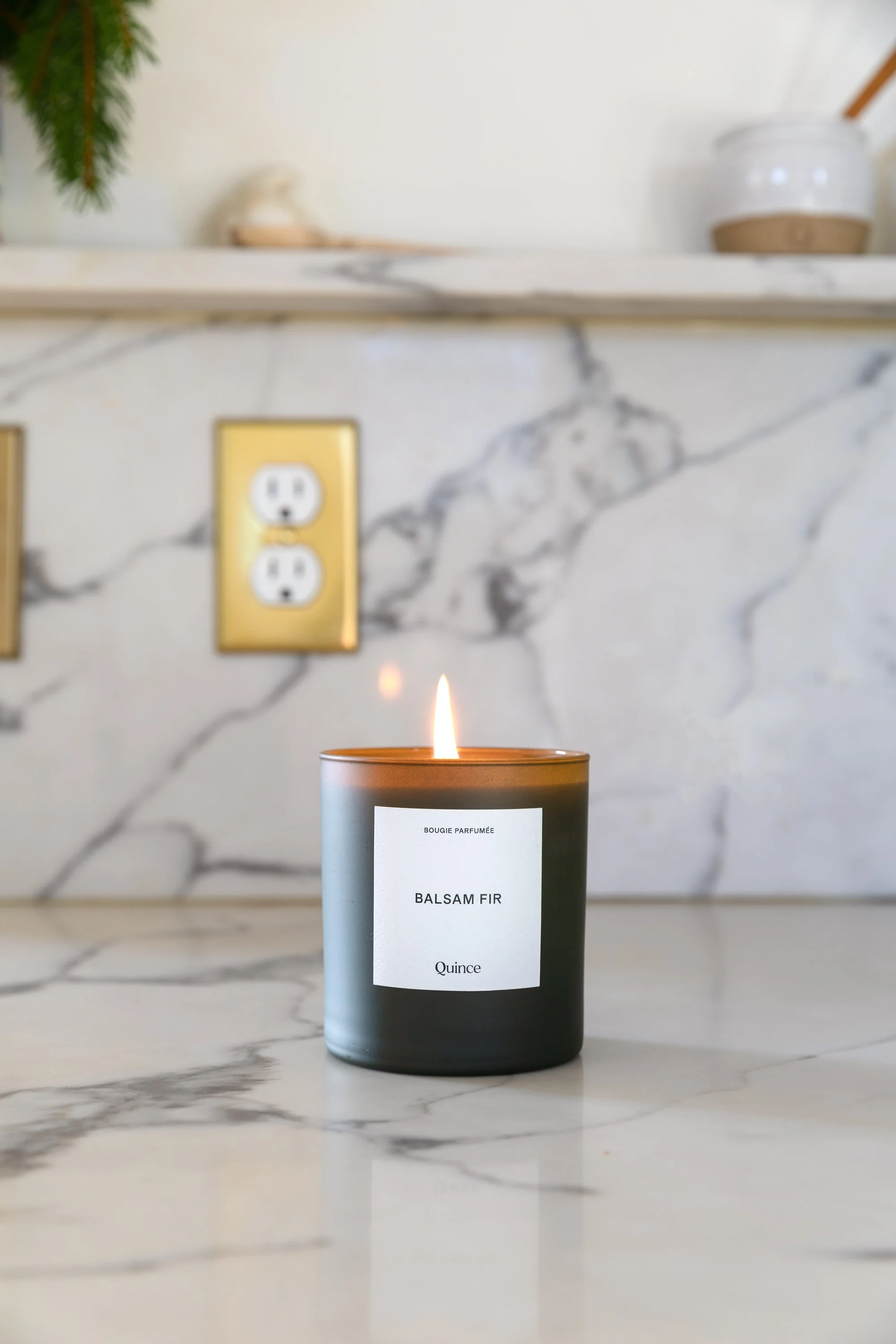 Balsam fir holiday candle styled in the Poplar Cottage kitchen