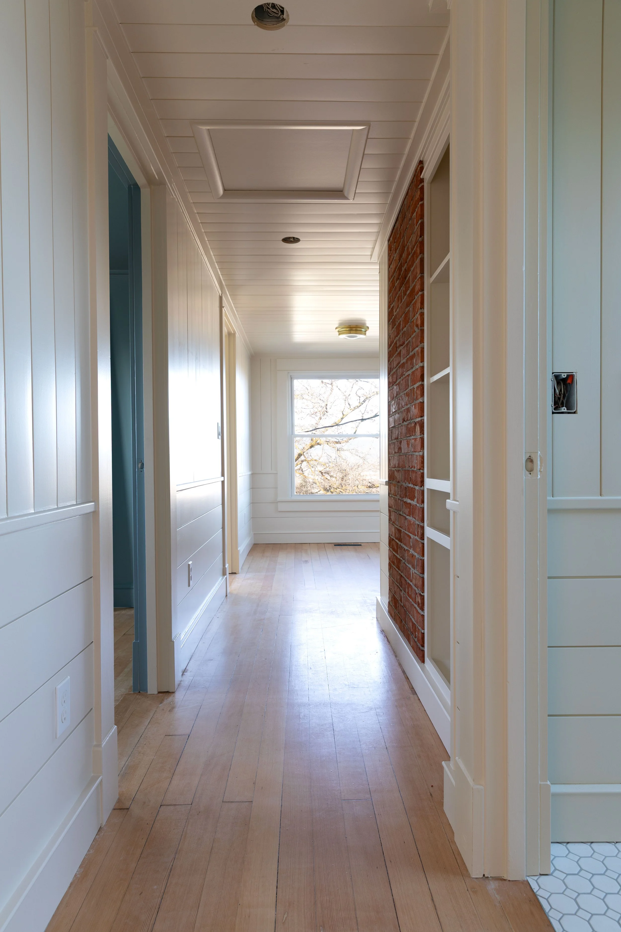 Wall paneling in the Hill House renovation painted in Slipper Satin