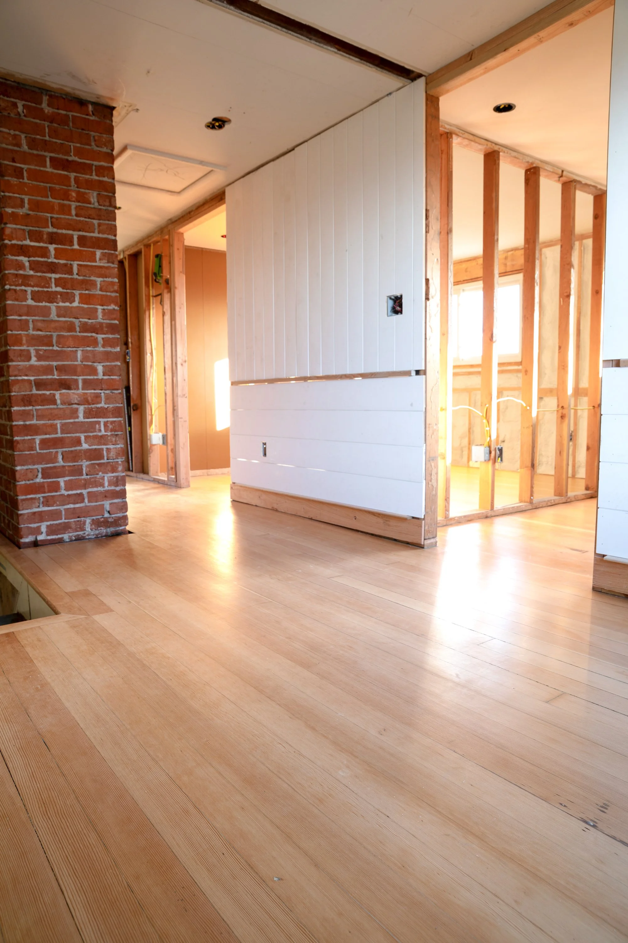Refinished fir floors running through upstairs hallway at the Hill House