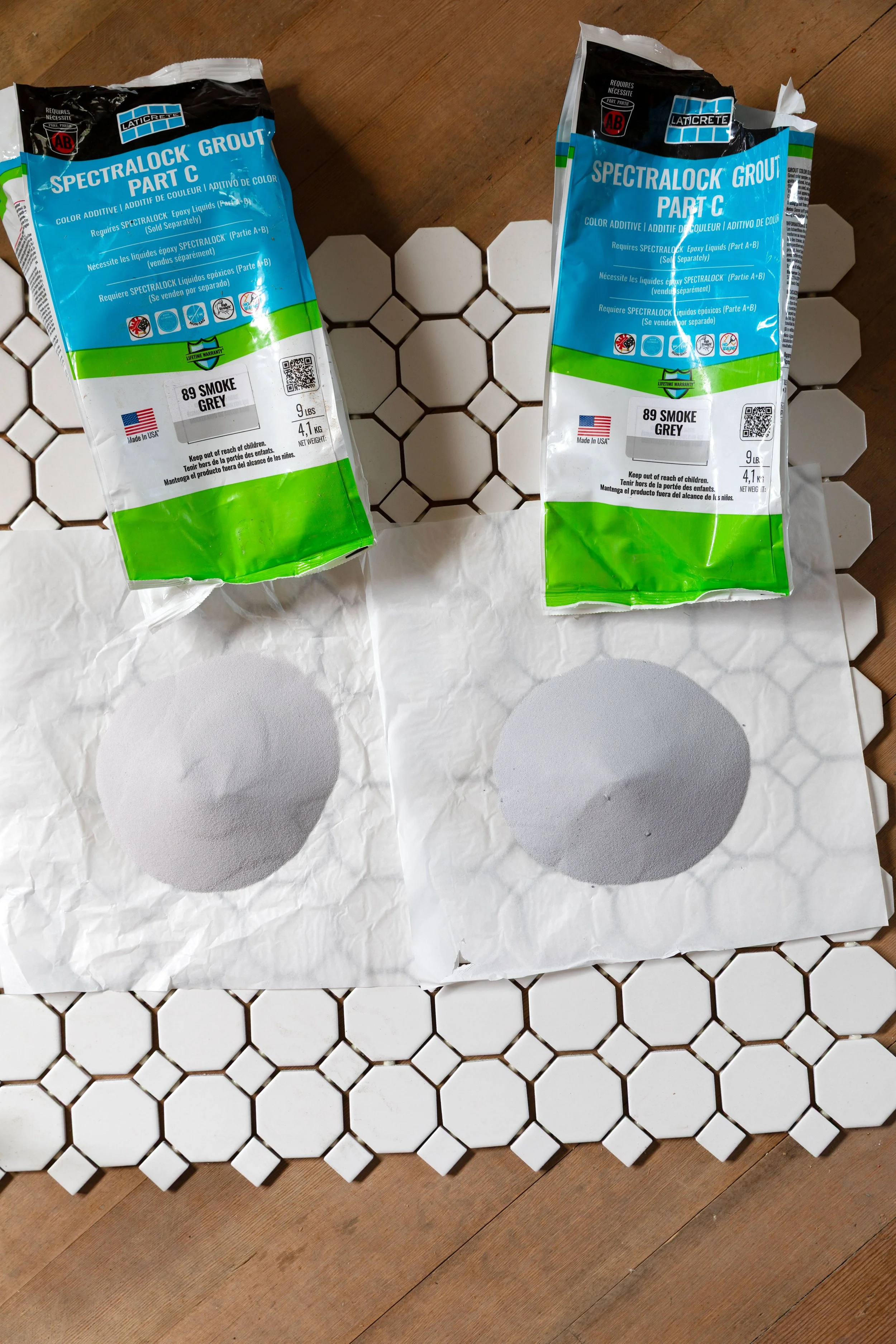 Color variation between two units of the same epoxy grout in the Hill House hall bathroom floor