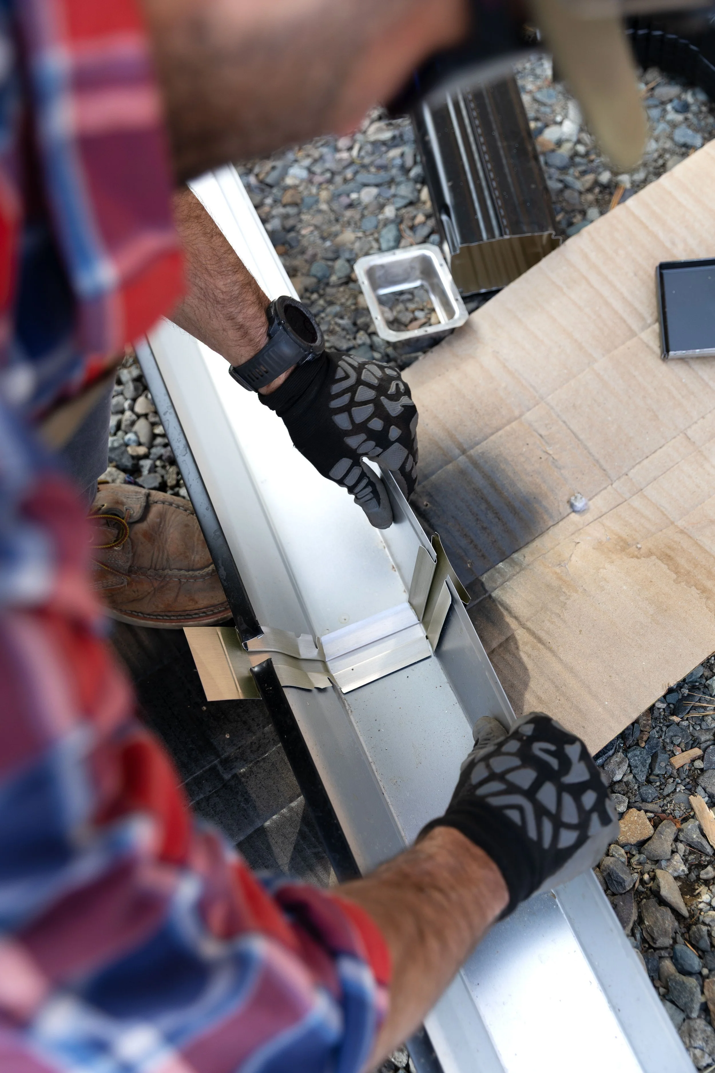 How to install gutters yourself — step-by-step black aluminum gutter guide