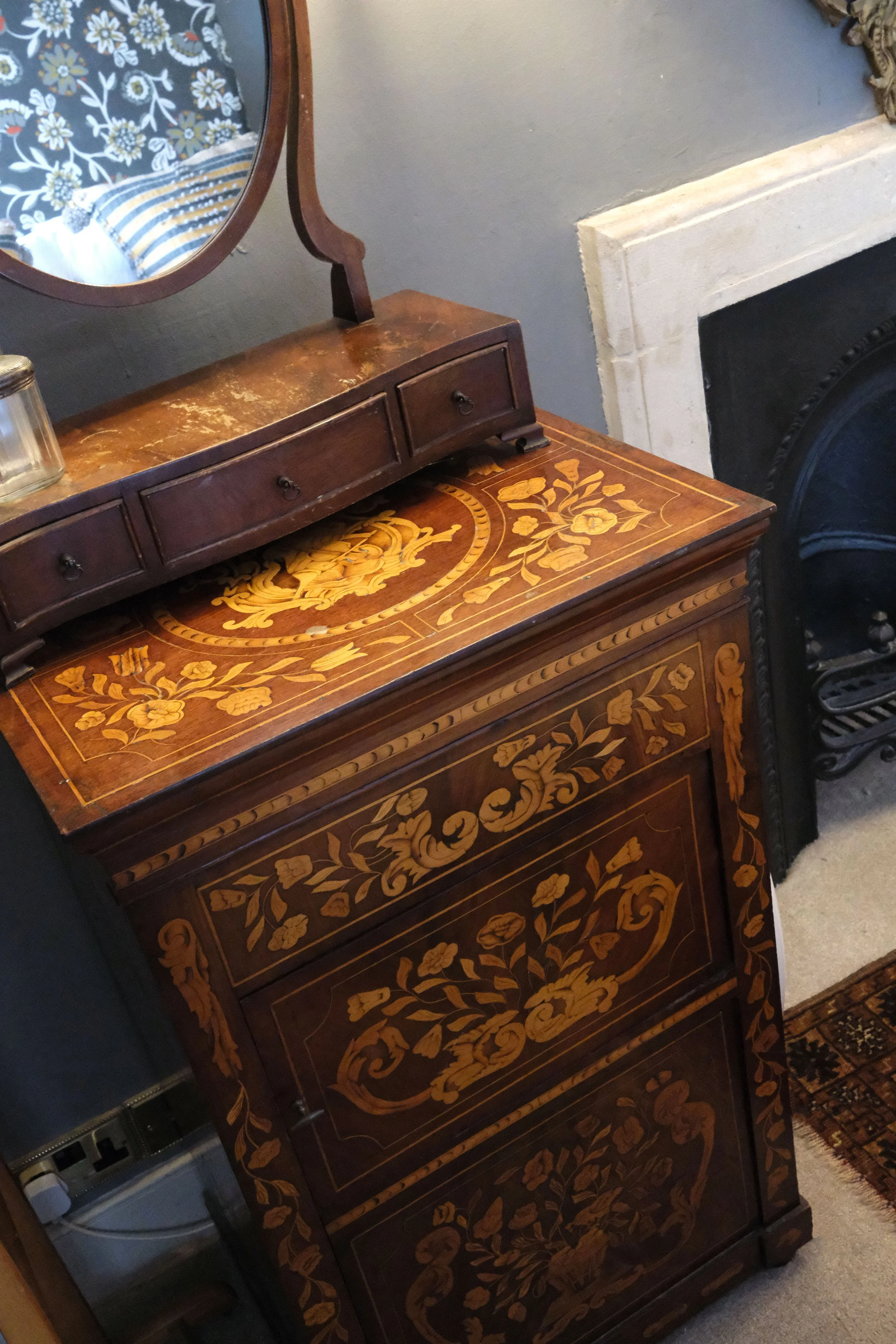 Vintage furniture and art in a historic Bath apartment England