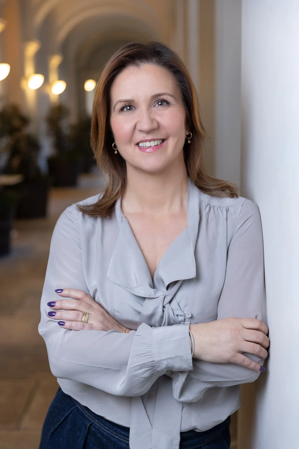 Environmental Headshot photograph natural portrait of female business owner on location