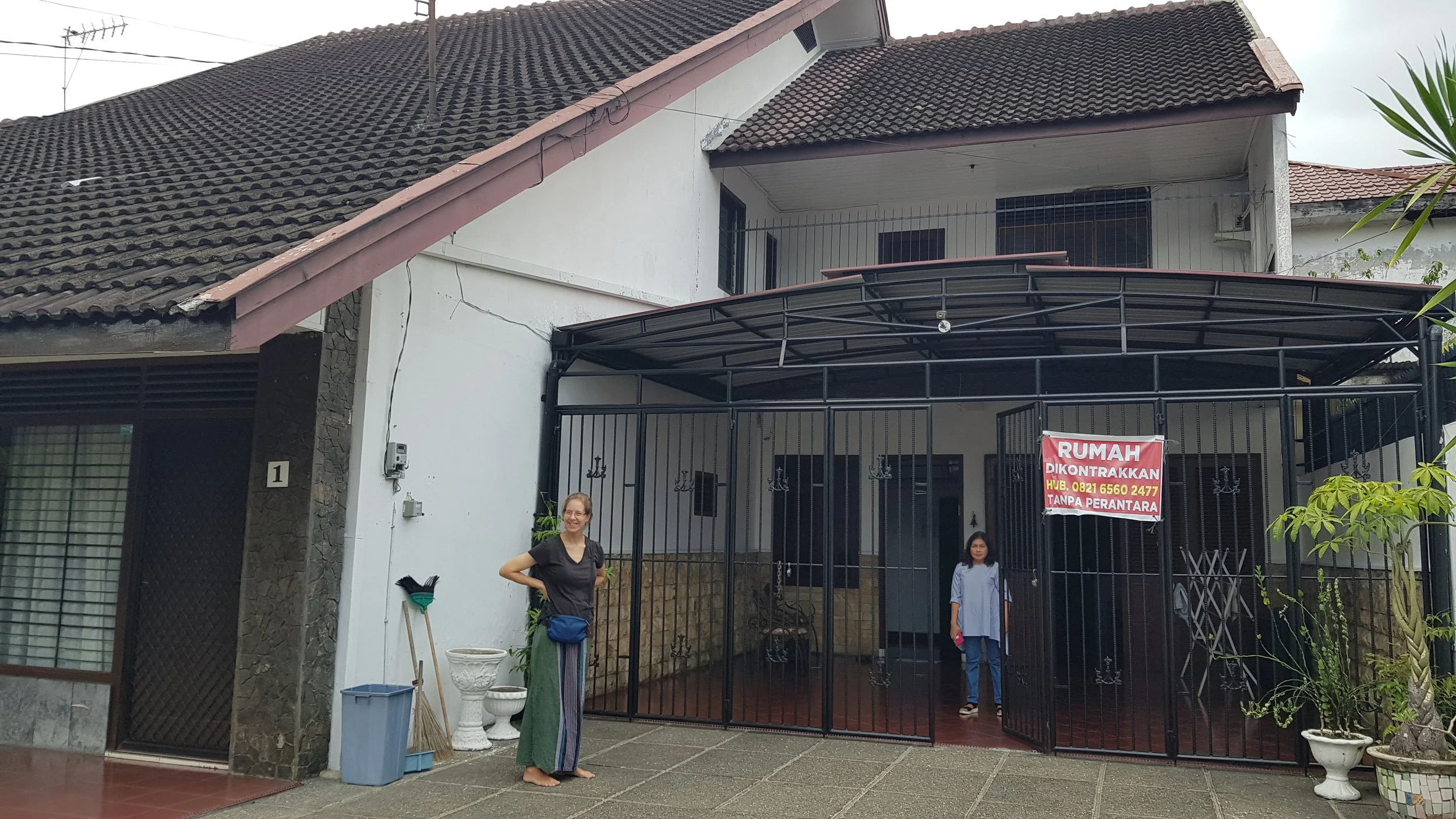 This is our home in Medan. Pictured on the right is Cheryl Ferry who lived here previously. Behind the gate is Ibu (Mrs.) Nana our land lord.