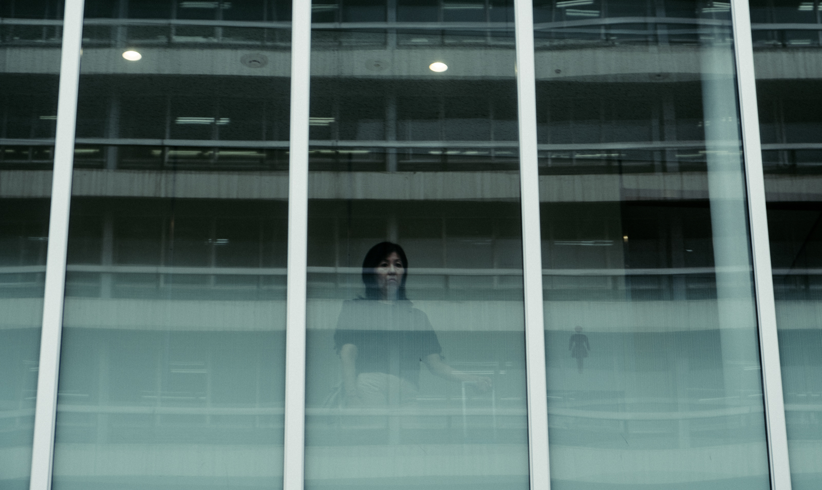 Women-looking-out-window-japan-2015.jpg