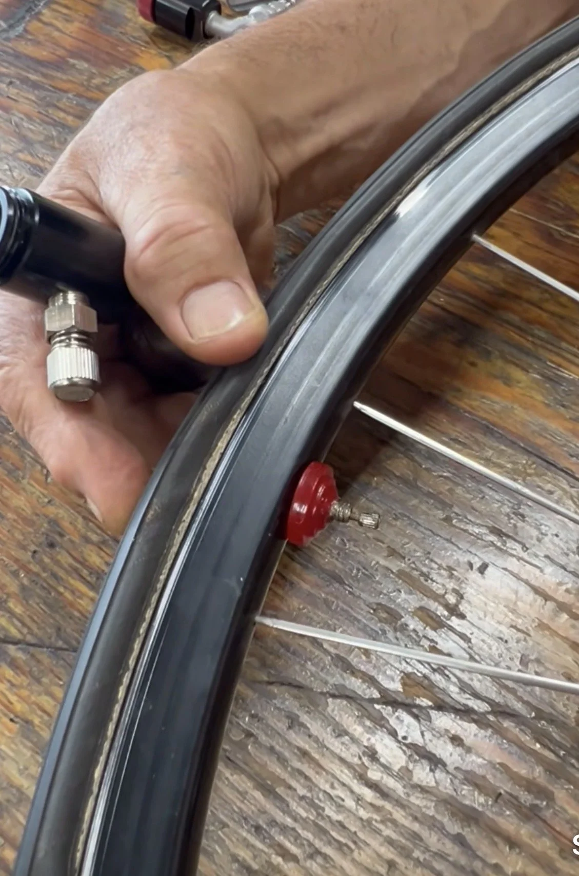 Urethane Pump on tire w  B hands III.jpg