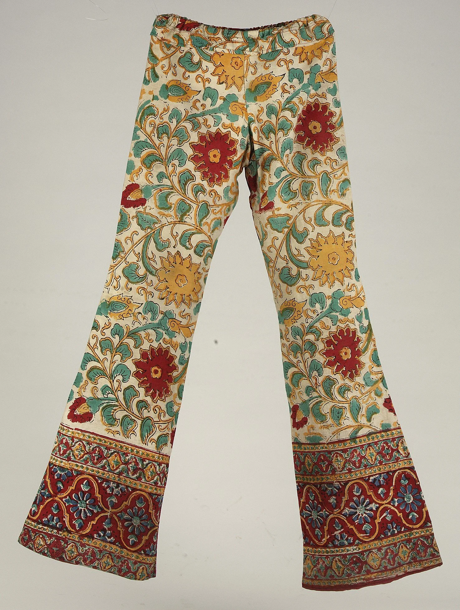 bell bottom pants with red and yellow flowers