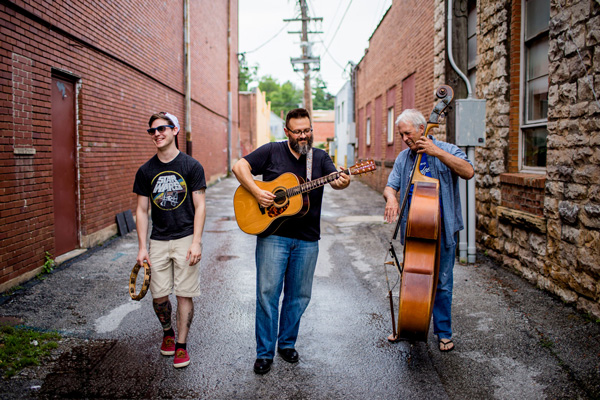 Aaron Smith and The Coal Biters is an Arkansas Ozarks band that embraces its roots . . . the band members love their hometown, the Buffalo National River that flows nearby, and all the folk and pioneer history that flows through these ancient hills. Their original songs, written by front-man Aaron Smith, draw from folk, roots, and Americana musical styles to ponder the mysteries and joys of human existence in today’s world. It’s not often that you see three generations of musicians who have found a common groove– but the Coal Biters have found one, and they love sharing their music and ponderings with their fans. The river Jordan and Styx have both been used to symbolize the passage from one life to the next. In this song, the Mississippi takes that role, carrying departed souls into an ocean of lost loved ones. http://www.aaronsmithsongs.com/