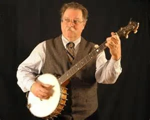 Clarke Buehling is widely recognized for his interpretations of late 19th Century, classic finger-style banjo, and is in the forefront of the recent resurgence of interest in the earlier minstrel banjo style. Much of his material is based around his extensive collection of 19th Century banjo and mandolin instruction books and sheet music. Clarke teaches banjo, fiddle, mandolin and guitar in Fayetteville, Arkansas.