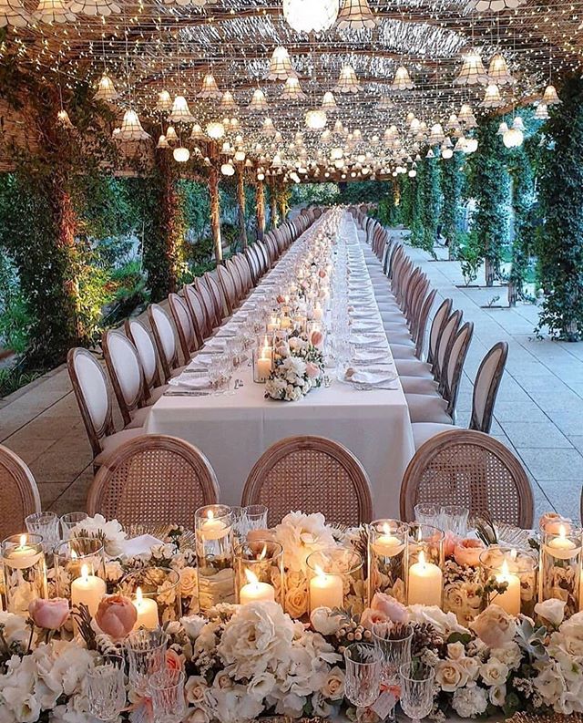 What makes the perfect decor for any occasion? How about a mix of lighting, romantic candles and roses? Repost @gloryboxproductions #weddingdecor #romanticcandles #weddinginspiration