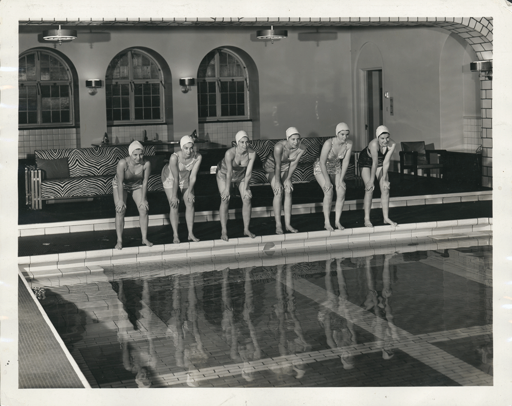 Students prepare to dive into the pool in Mellon Hall, c. 1940