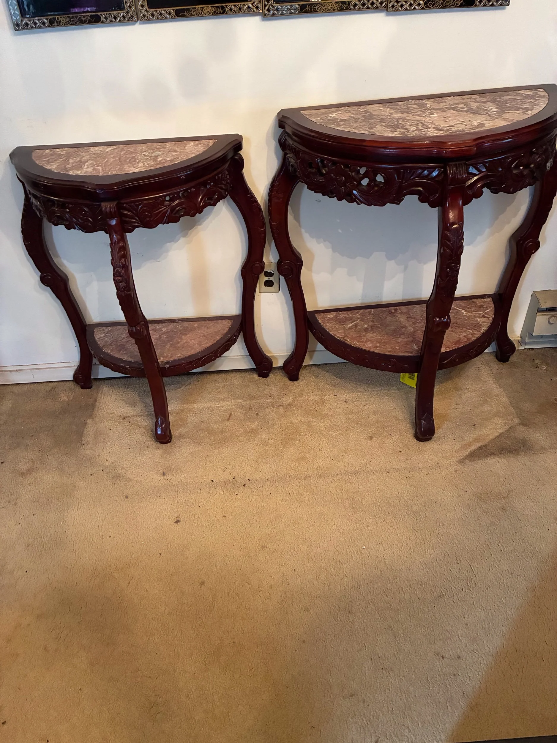 Lot 4-Chinese inspired Two half moon carved tables  