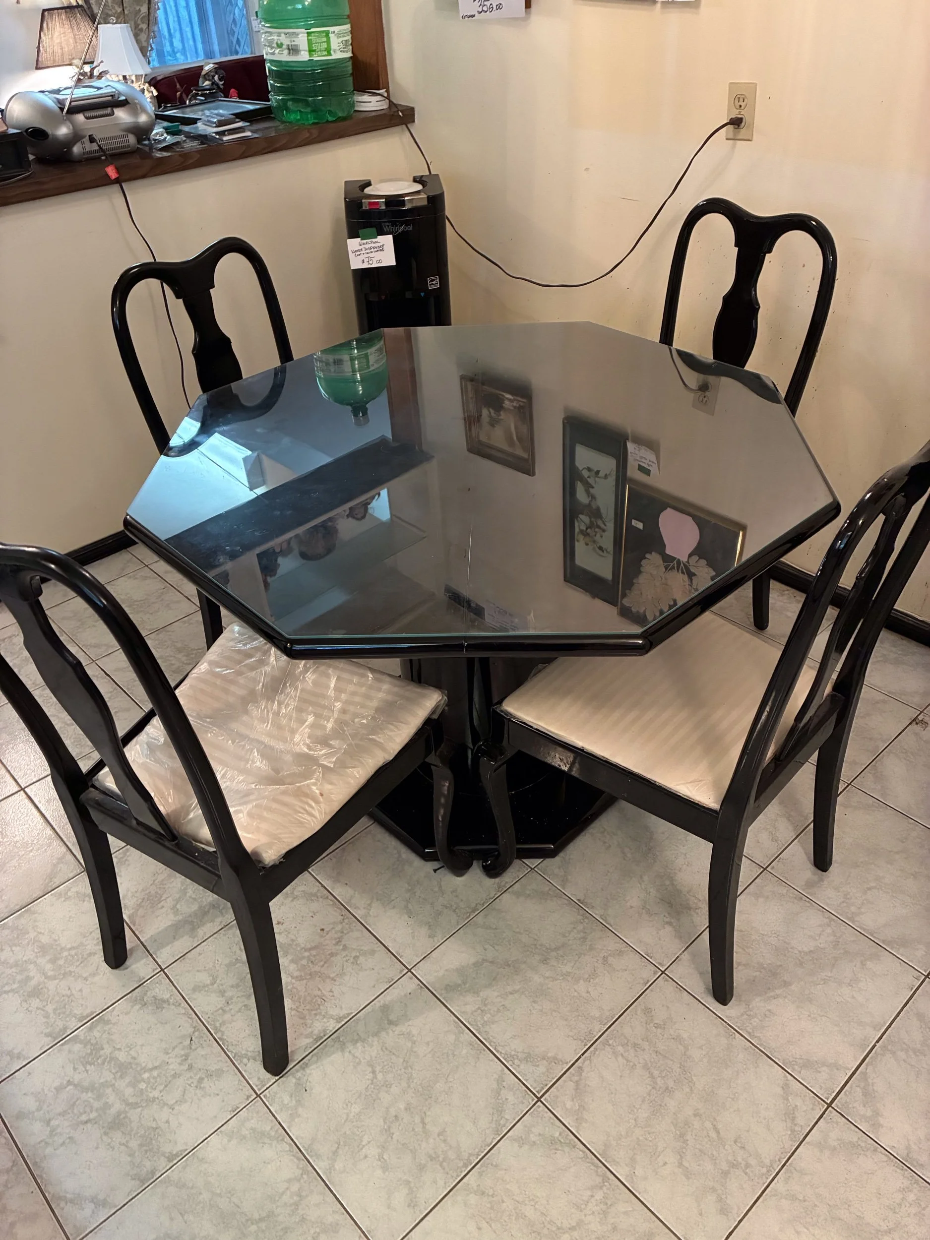 Lot 32 - Black lacquer octagonal table