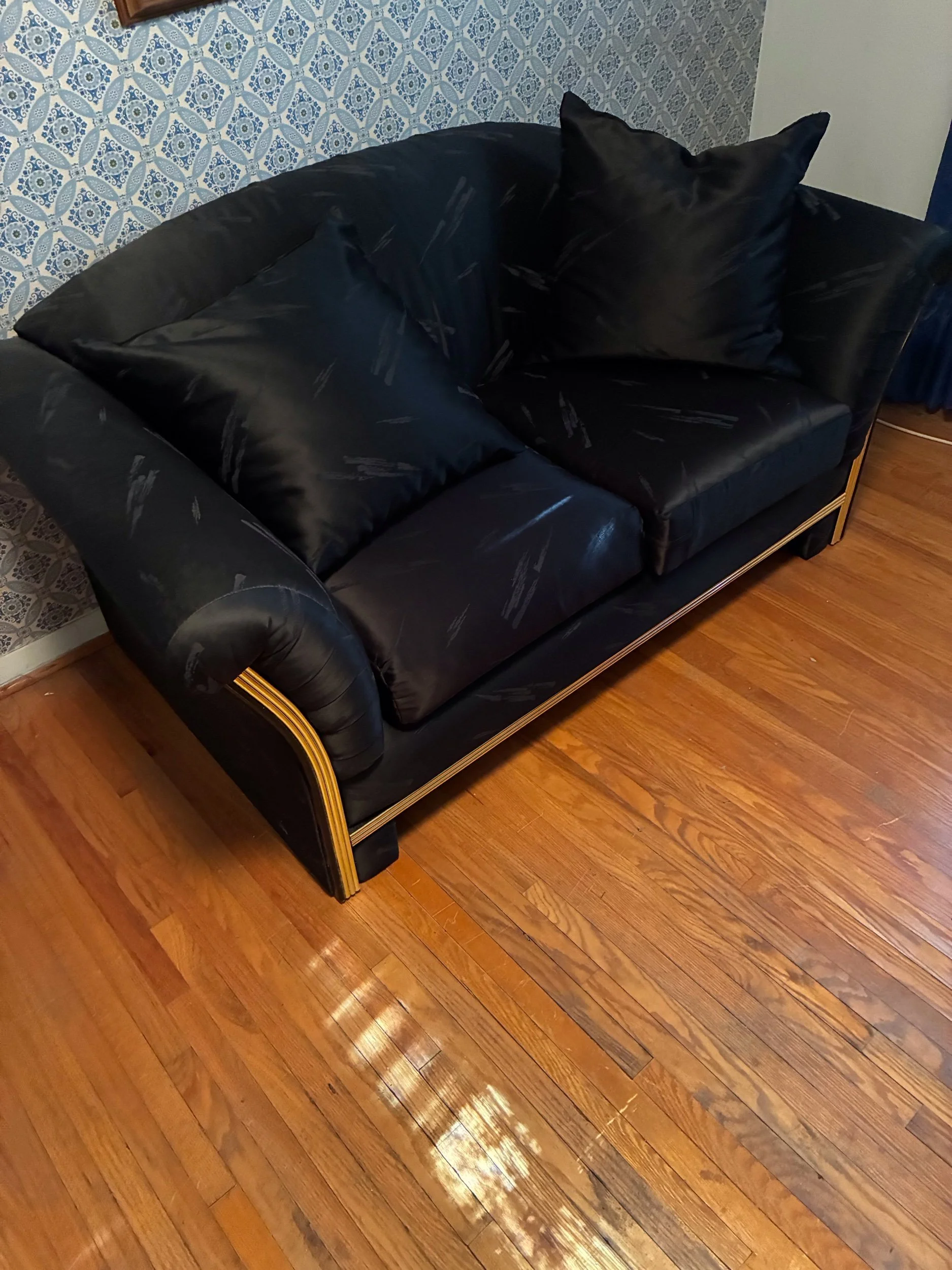 Lot 34 - Dark blue sateen covered love seat