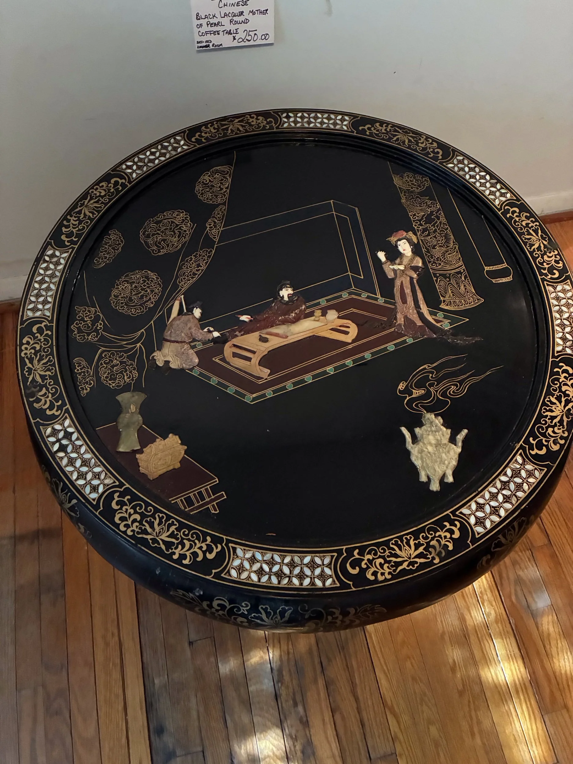 Lot 37 - Round black lacquer coffee table