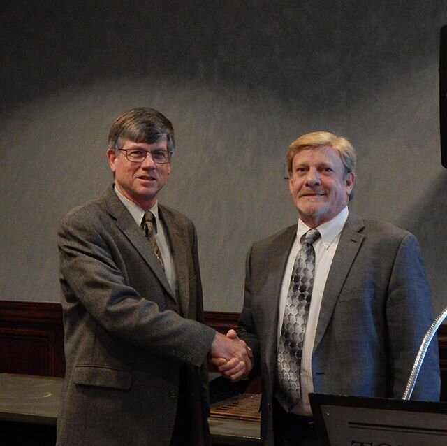 Dr. Chris Penney, P.E., President of ASCE Norfolk Branch congratulates Dr. Gary Schafran of ODU Civil and Environmental Engineering on his ASCE lifelong membership.