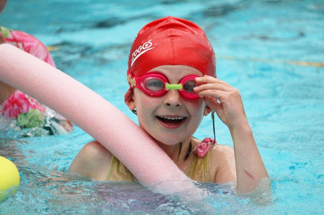 Truro High Pre-Prep pupil dives into the school's 22.5m pool during her weekly swimming lesson.jpg
