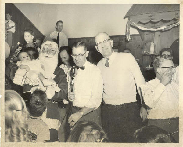 Find the Ambrose Quaile and Rivell in the QC Xmas Party photo.jpg