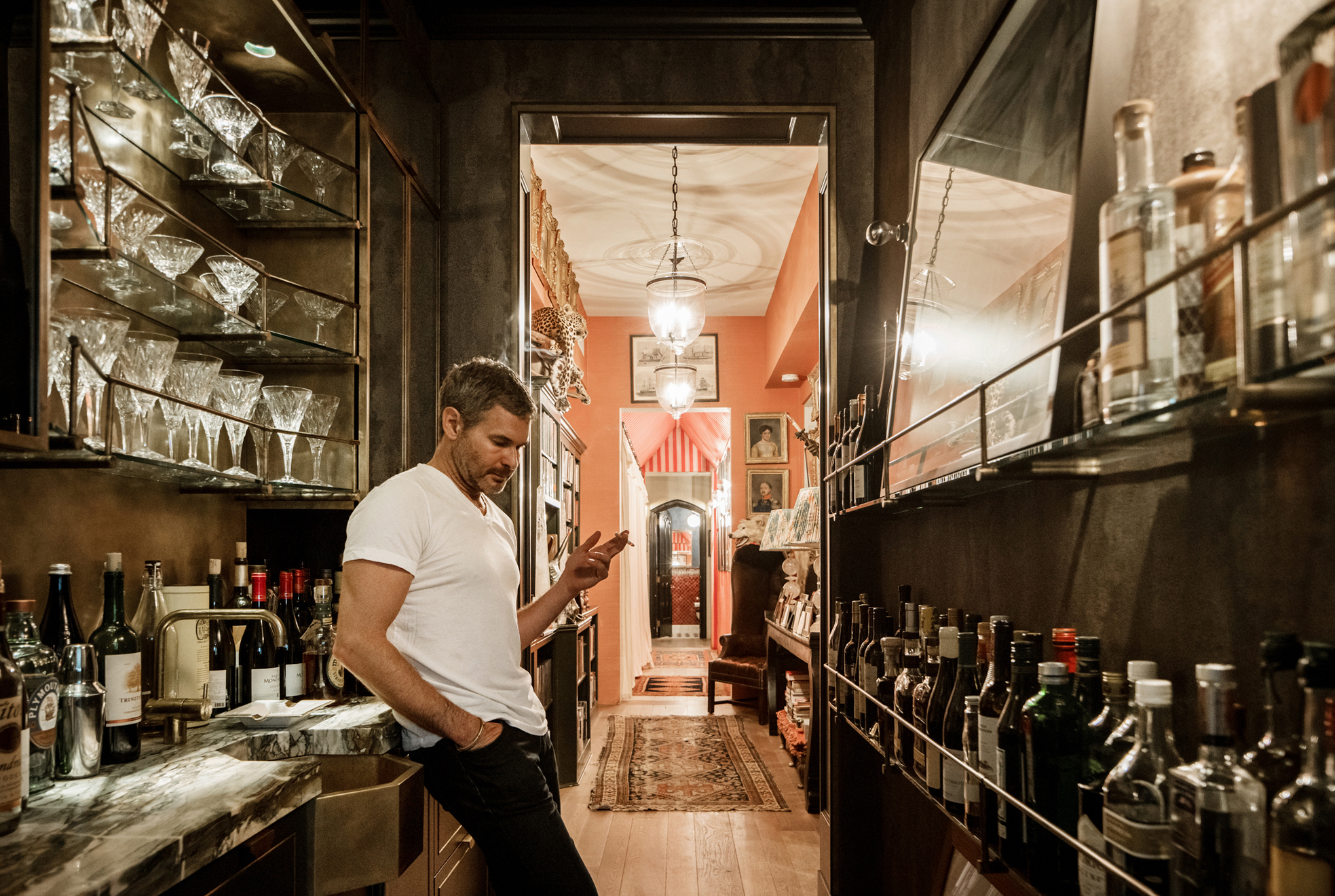 Bronson Van Wyck in his NY apt bar.  Photo by Stephen Karlisch